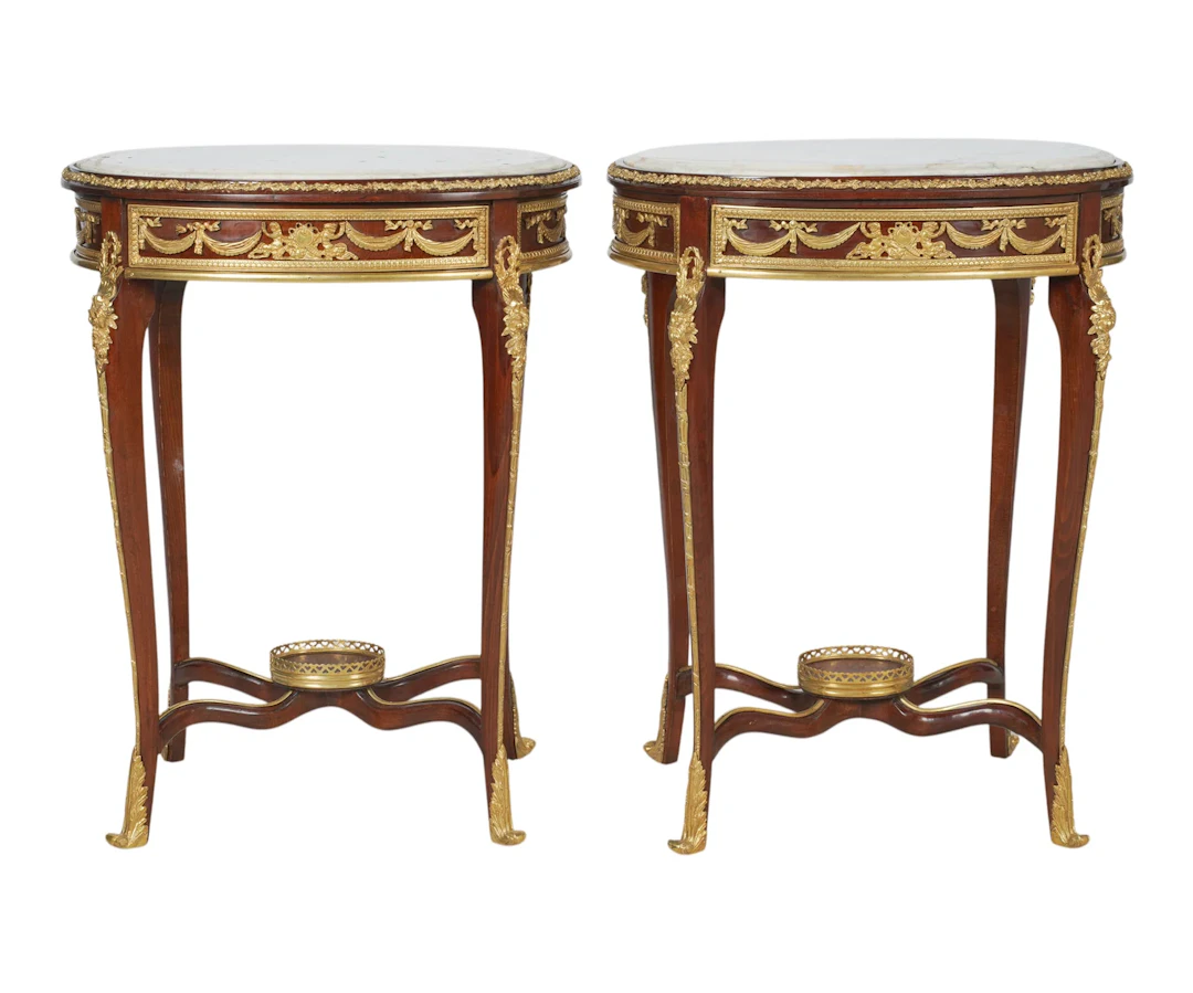 A Pair of French Louis XVI-Style Gilt Bronze Mounted Marble Top Tables