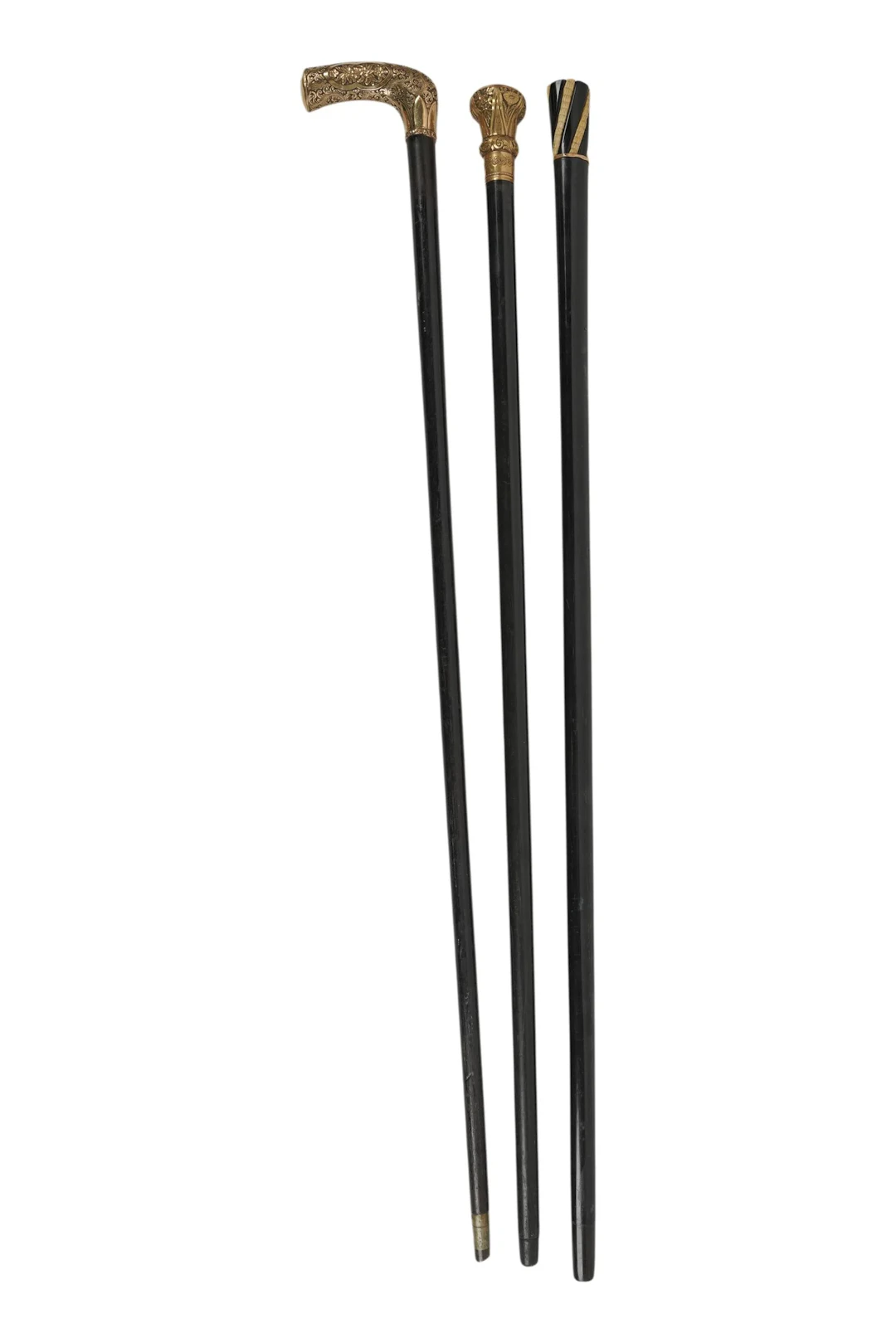 A Collection of Gold and Gold-Filled Walking Sticks