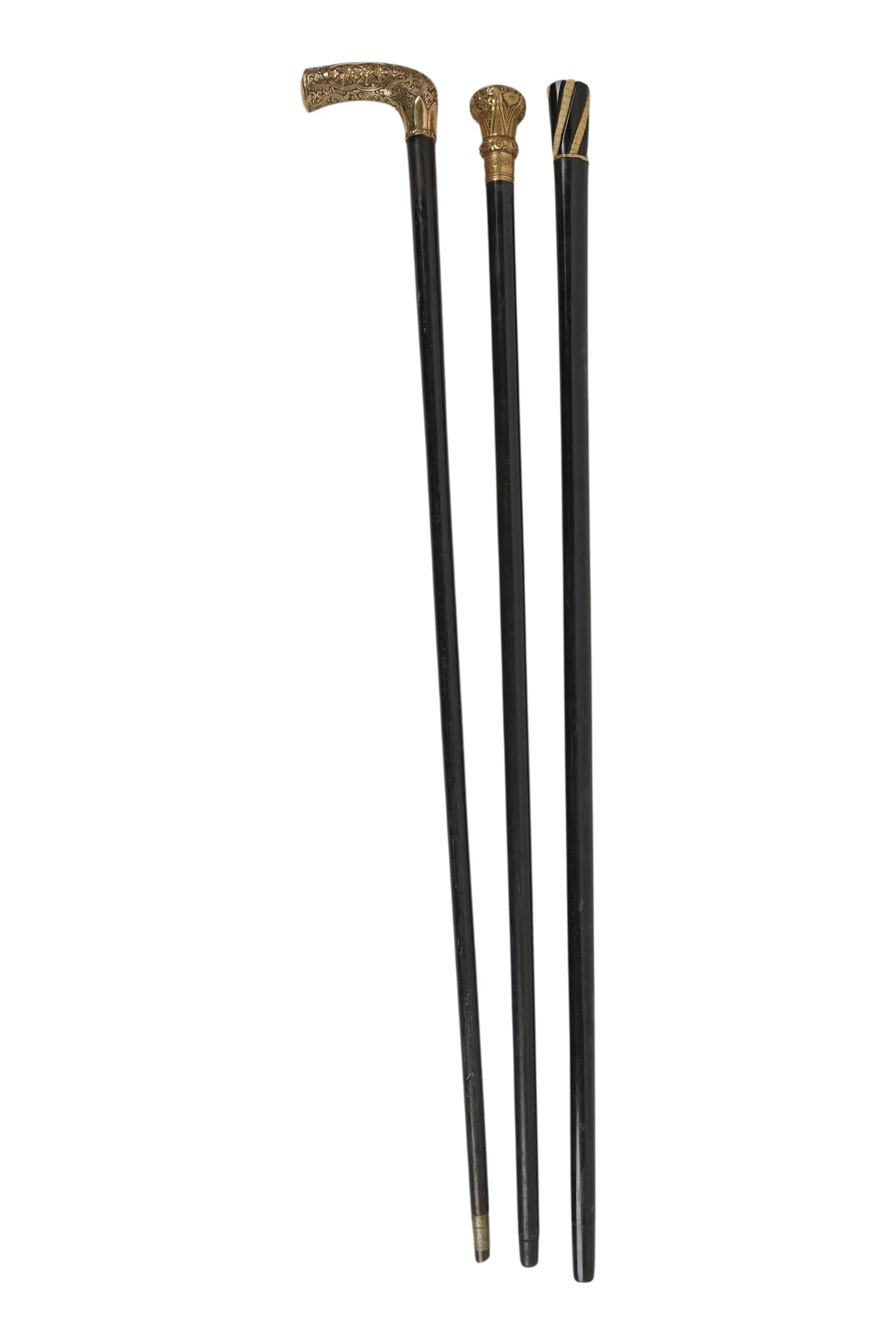 A Collection of Gold and Gold-Filled Walking Sticks