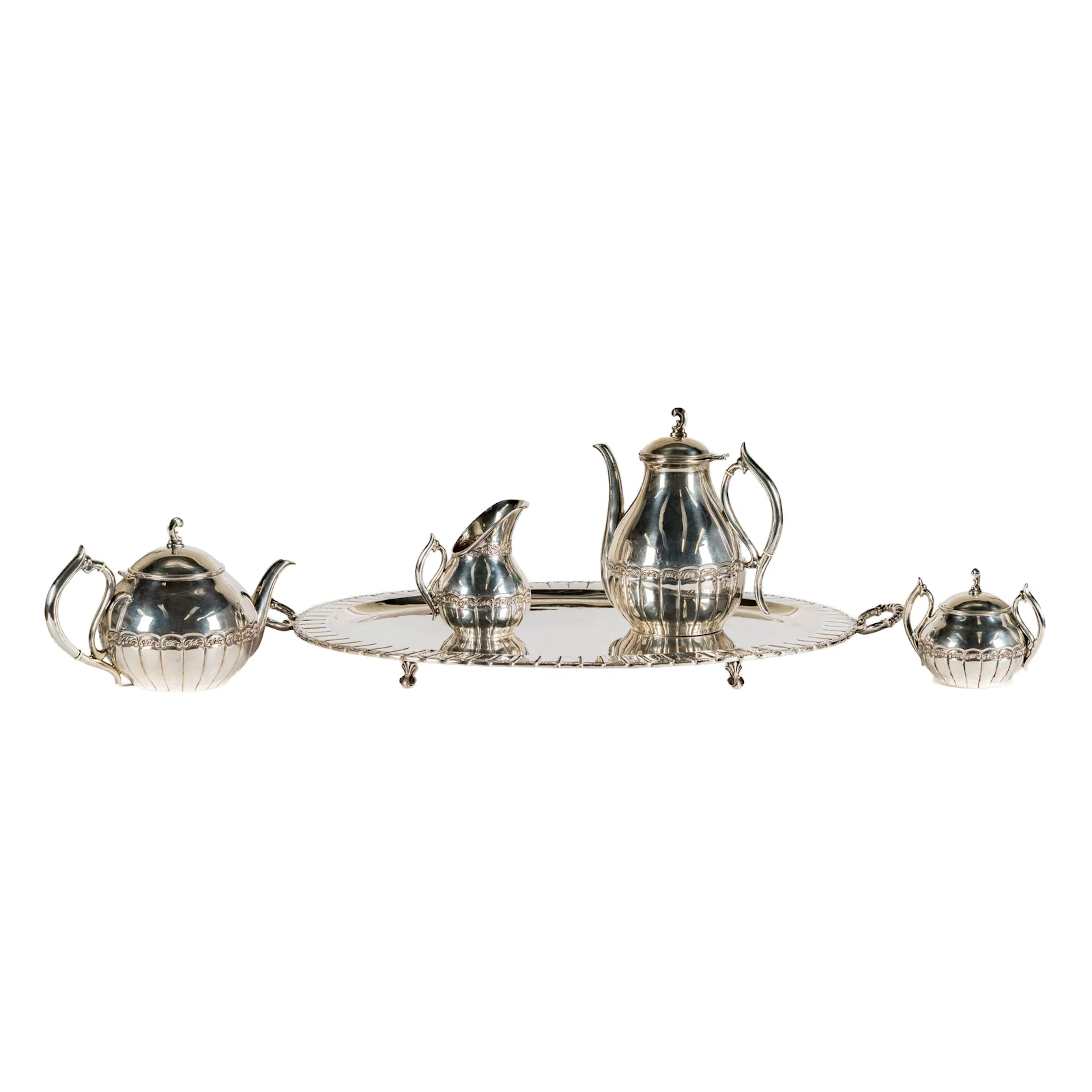A Sterling Silver Five Piece Tea and Coffee Service