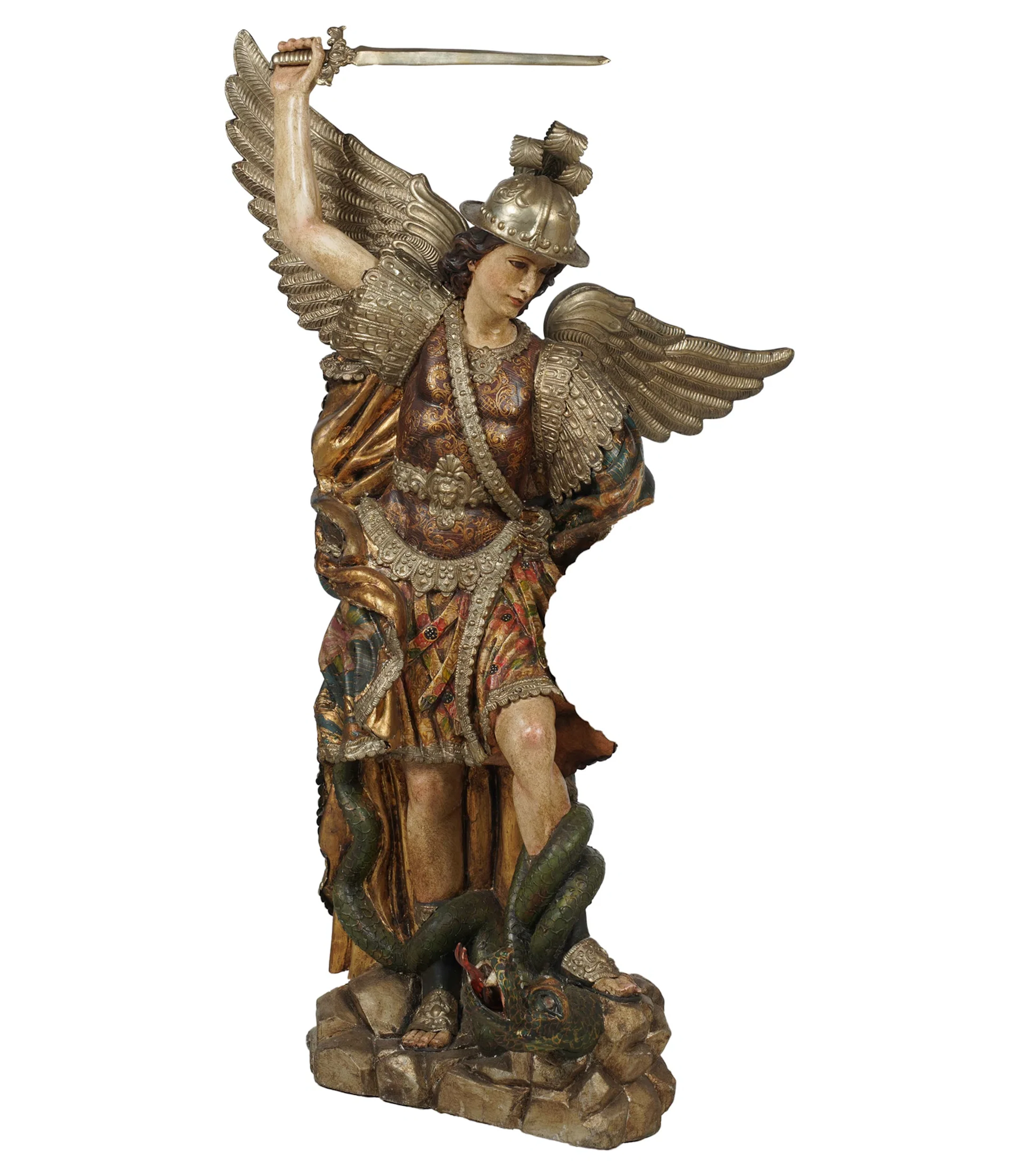 A Spanish Colonial Carved Wood Repousse Figure