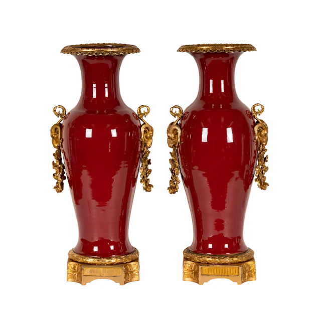 A Pair of Sang de Boeuf Louis XVI Style Ormolu Mounted Vases