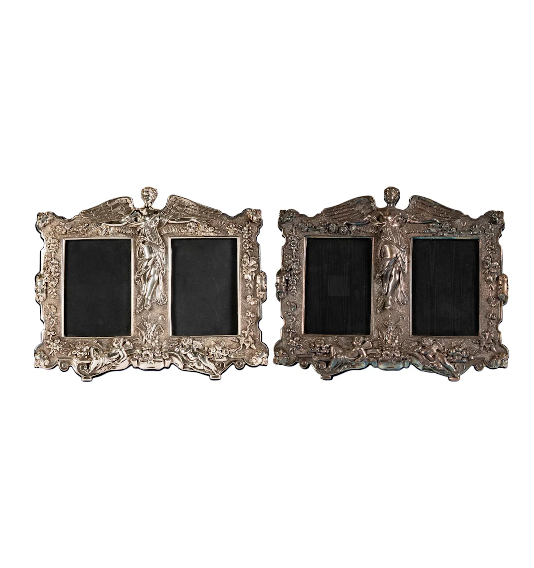 Two Sterling Silver Cherub Motif Picture Frames