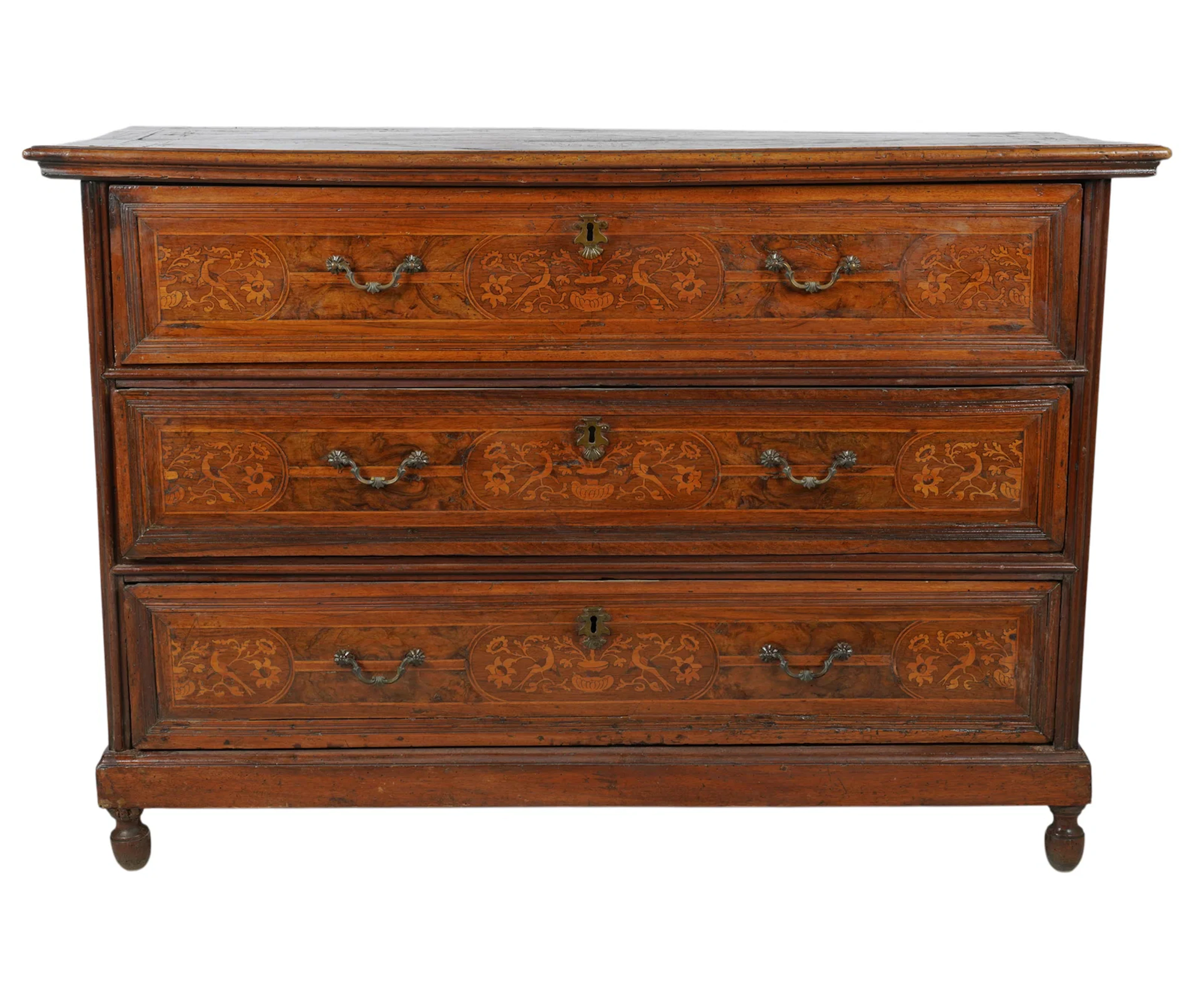 An Italian Inlaid Chest of Drawers