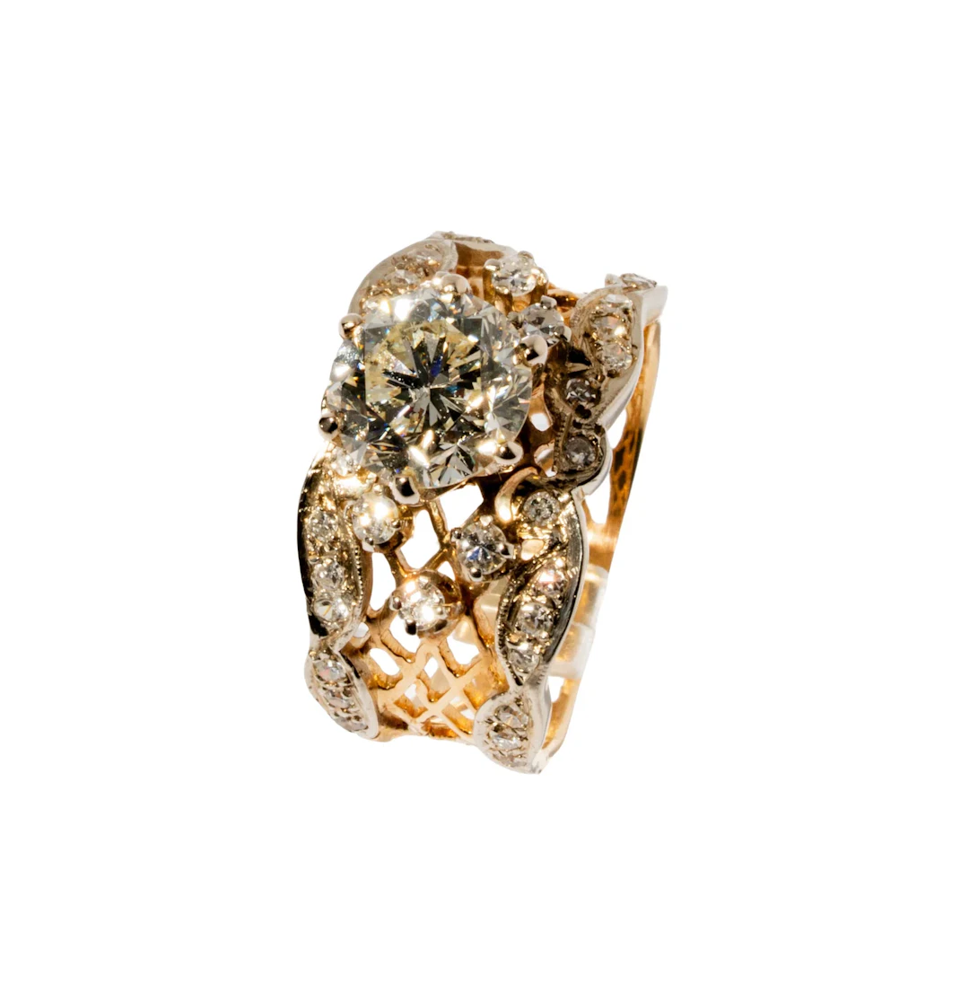 14 Karat Yellow Gold, Diamond, and Gold Ring