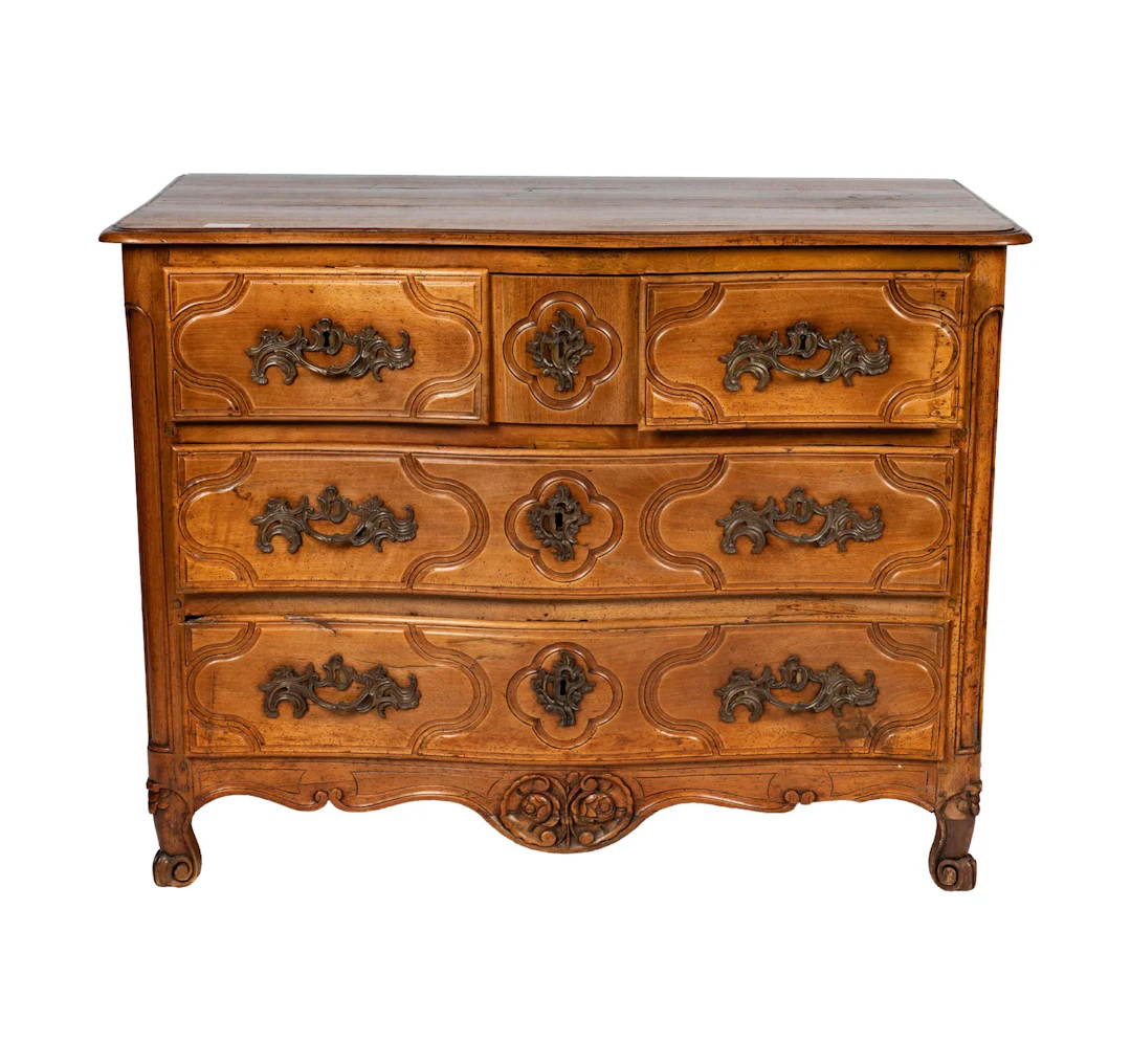 A Provincial Carved Wood Four-Drawer Chest