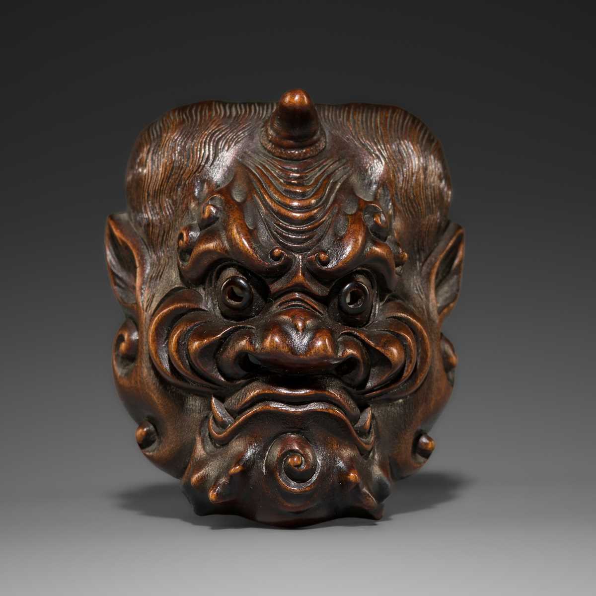A FINE WOOD MASK NETSUKE OF FUJIN | Barnebys