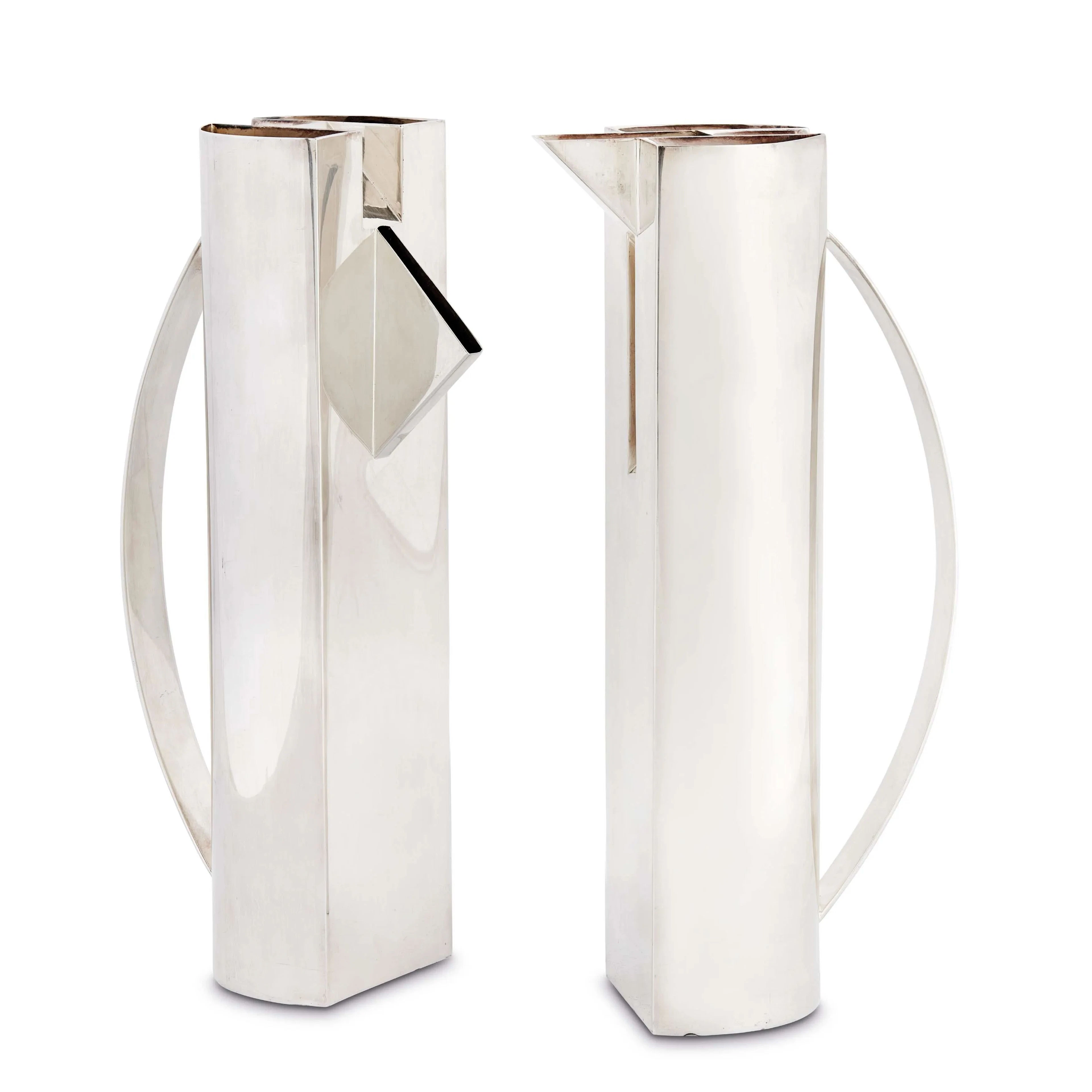 A PAIR OF SILVER CARAFES "LUI E LEI", MARIO BOTTA FOR CLETO MUNARI