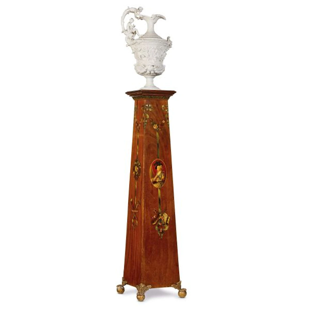 A DECORATIVE VASE ON A COLUMN, 19TH CENTURY