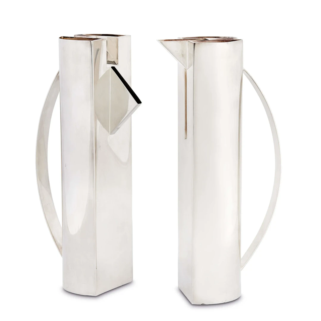 A PAIR OF SILVER CARAFES "LUI E LEI", MARIO BOTTA FOR CLETO MUNARI