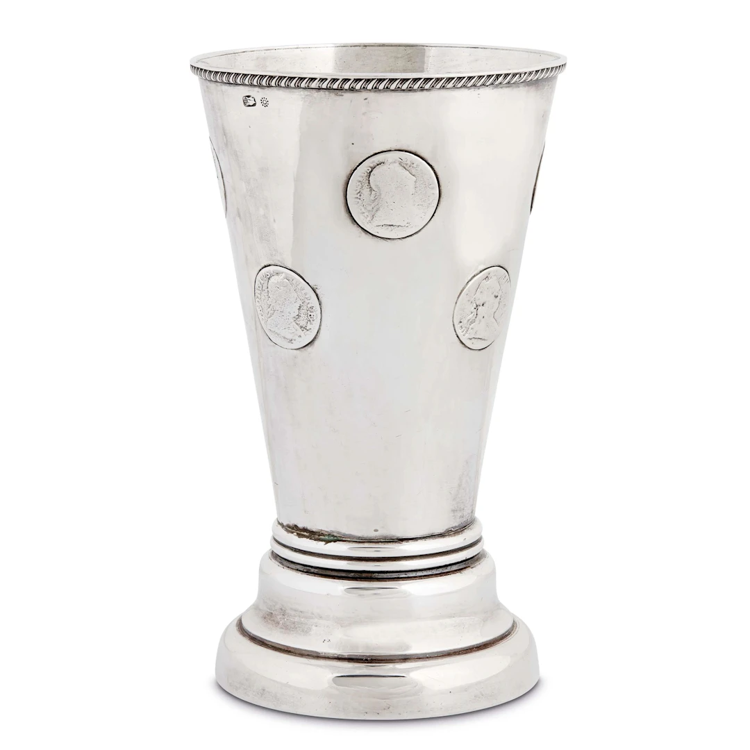 A SILVER GAMBLING CUP, 19TH CENTURY