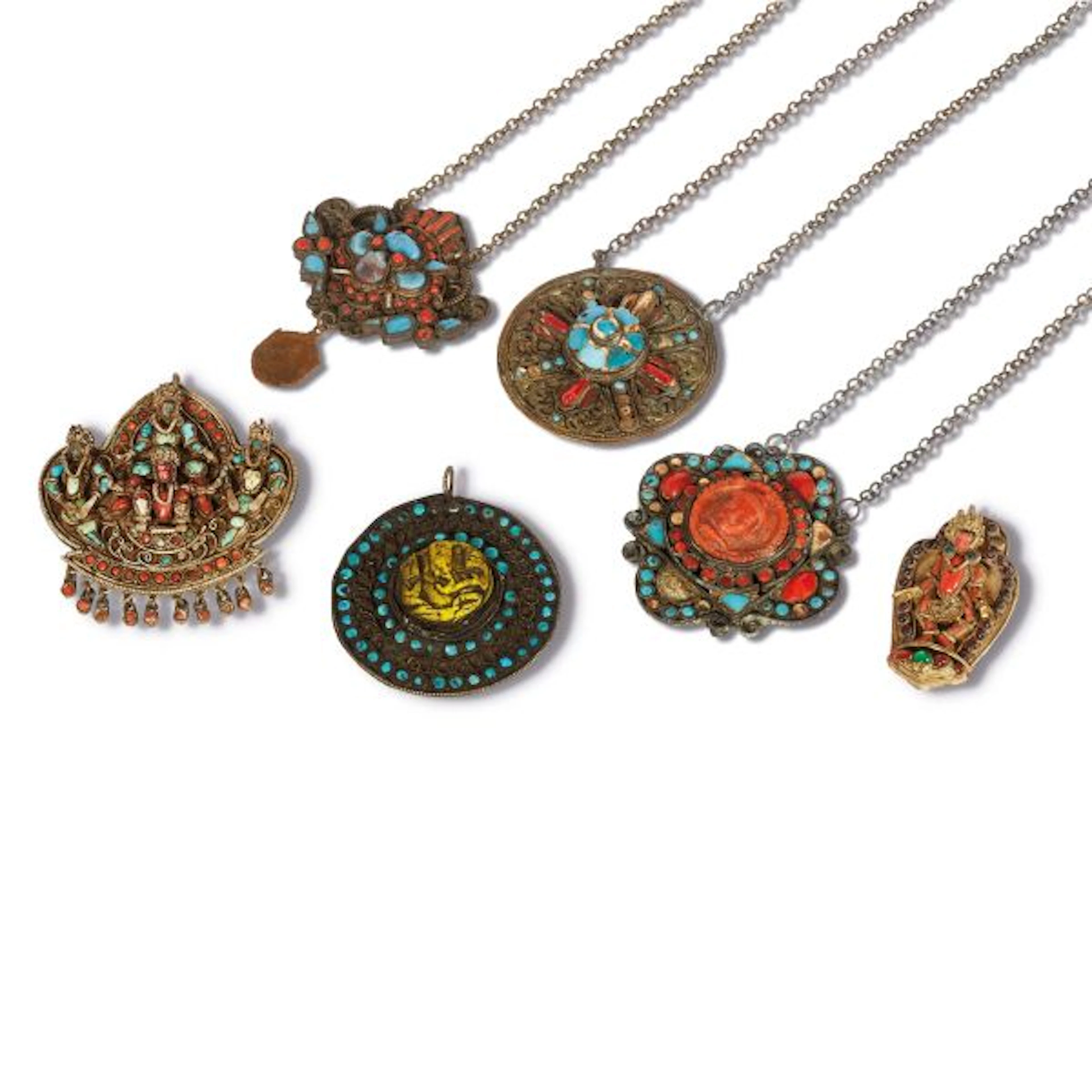 A GROUP OF SIX PENDANTS, TIBETAN, 19TH/20TH CENTURY