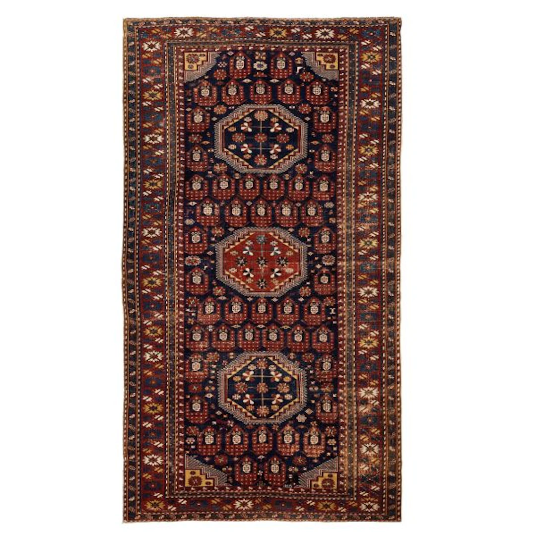 A CAUCASIAN SHIRVAN CARPET, 20TH CENTURY