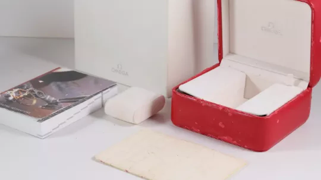 Omega Watch Box, Card Holder and Booklet.
