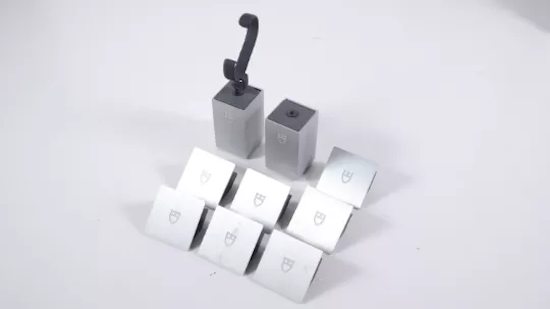 * TO BE SOLD WITHOUT RESERVE* TUDOR: 2x watch stands , 1x c-clip