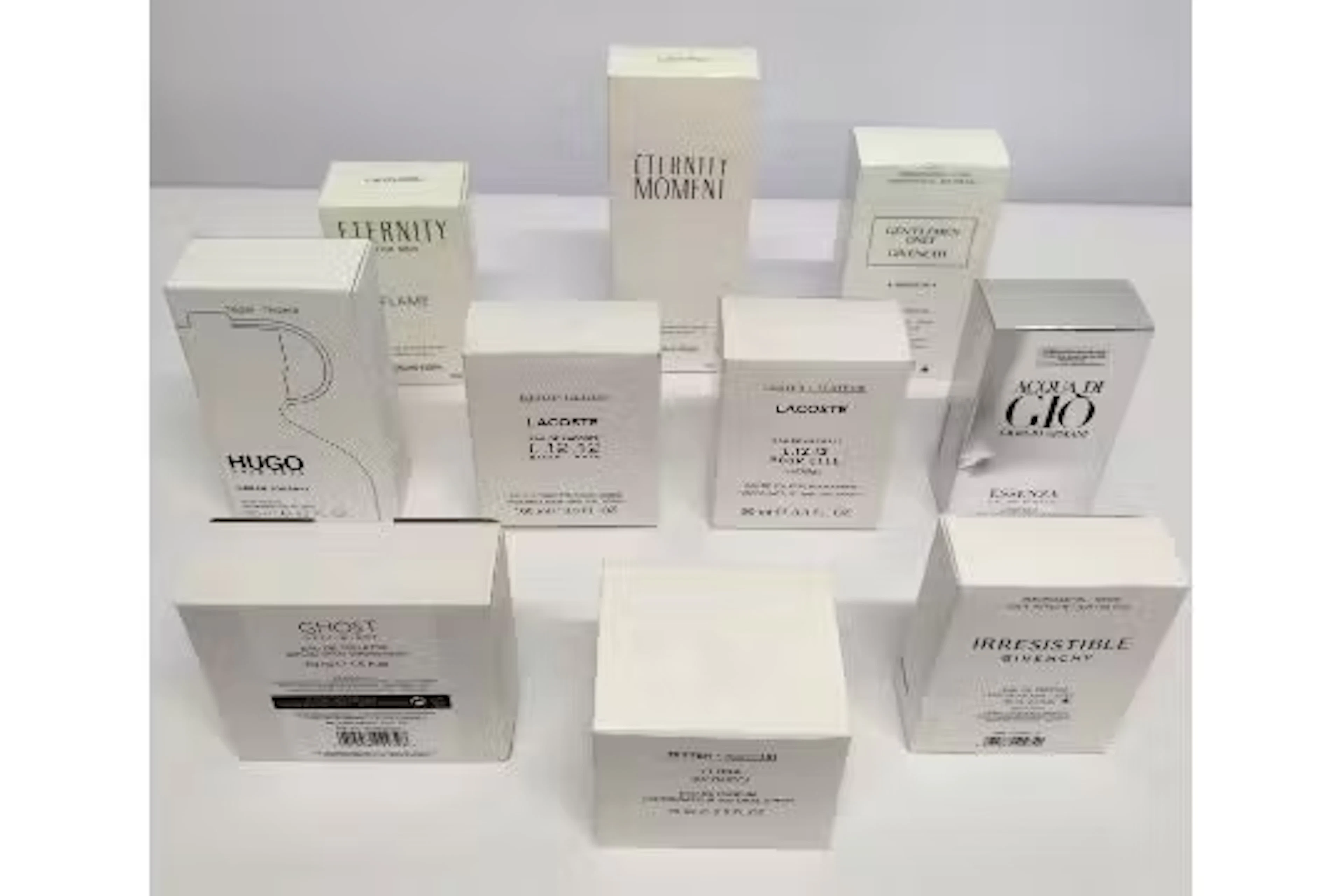 Thirty nearly new perfumes/testers and related to include Hugo Boss