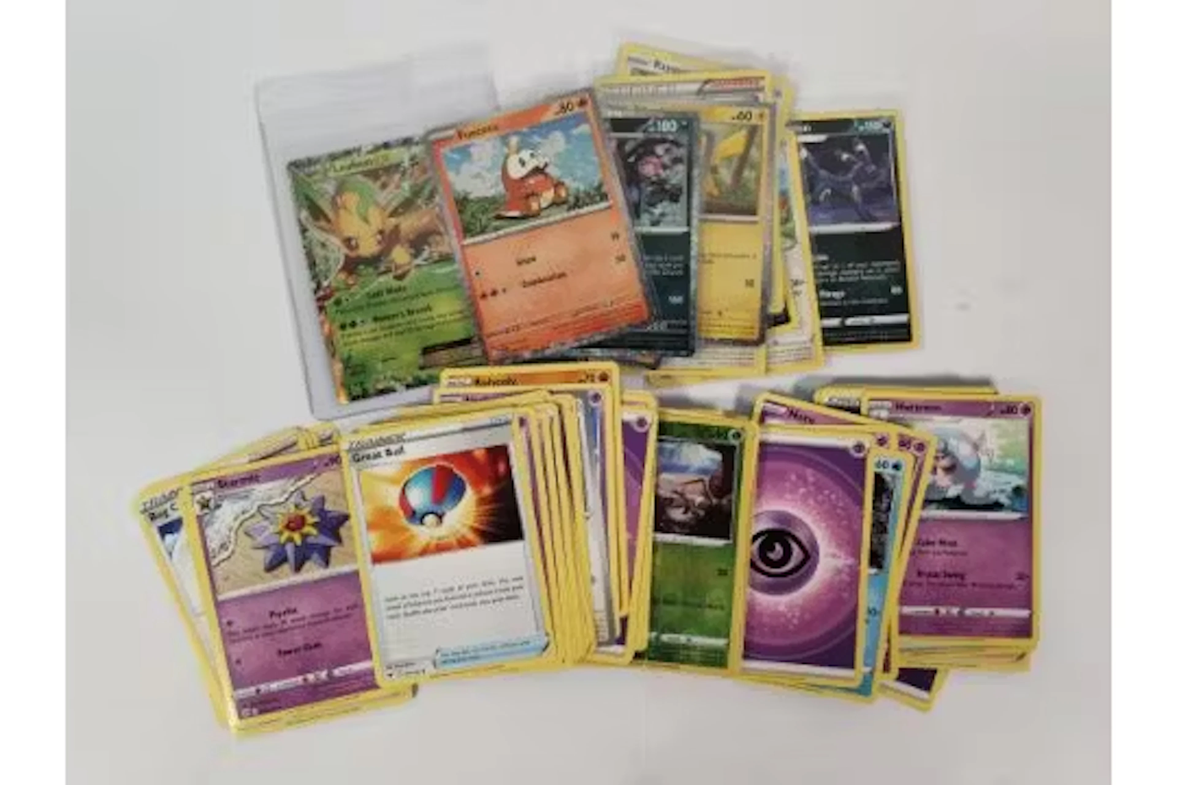 A quantity of assorted Pokemon TCG trading cards (approximately 80 cards).