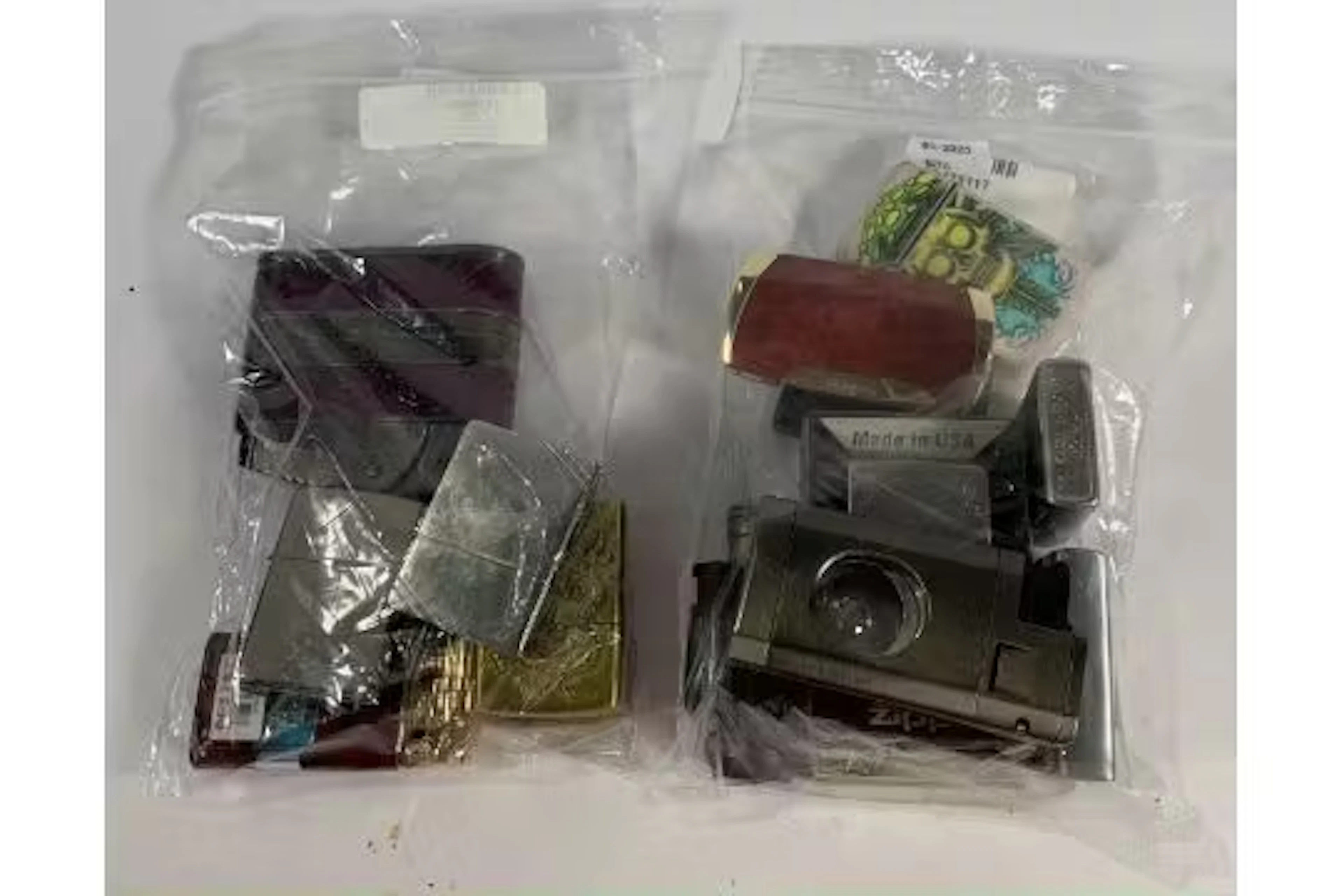 Fifteen pre-owned lighters to include Zippo and Siglo (over 18s only).