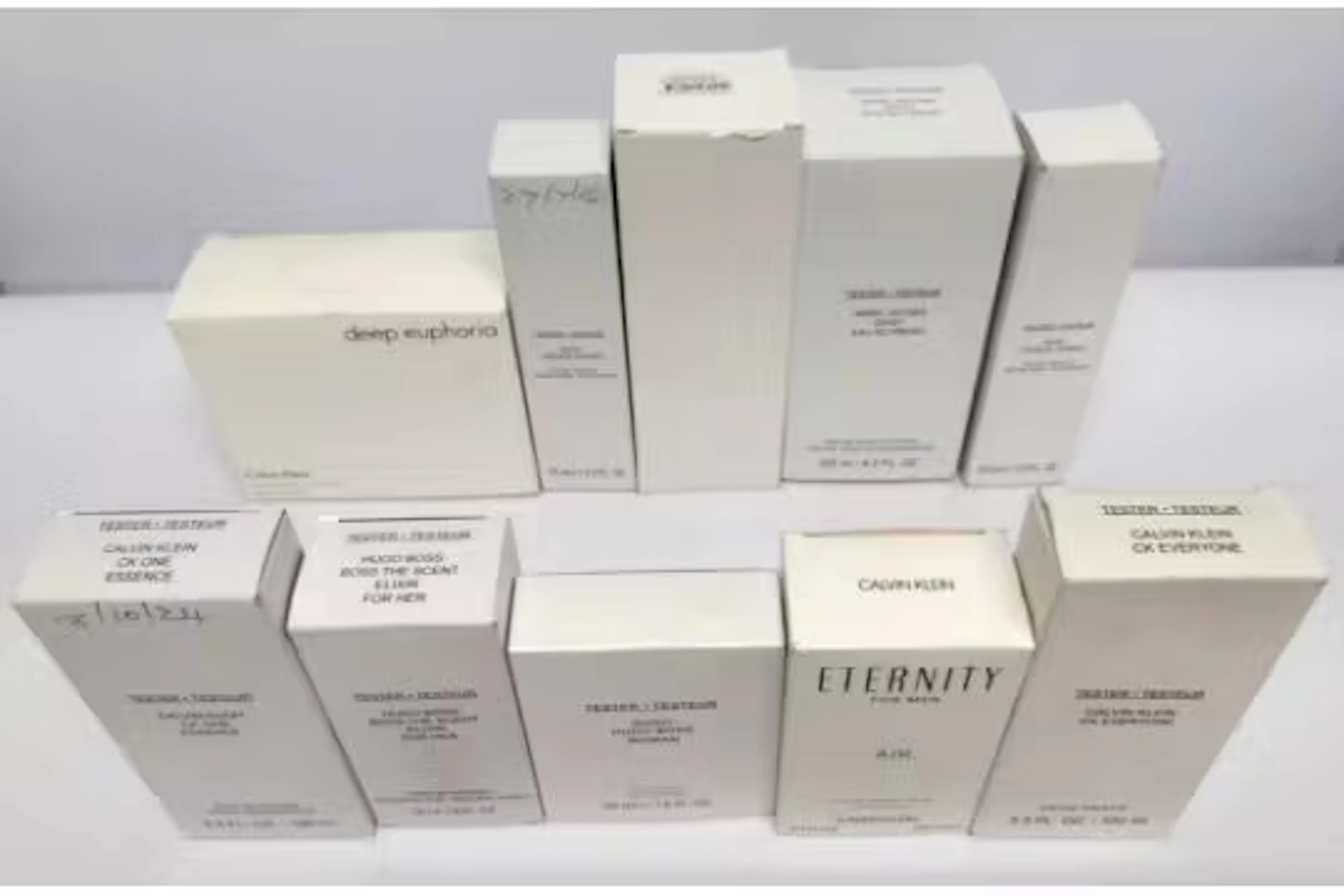 Thirty nearly new perfumes/testers and related to include Boss, Marc