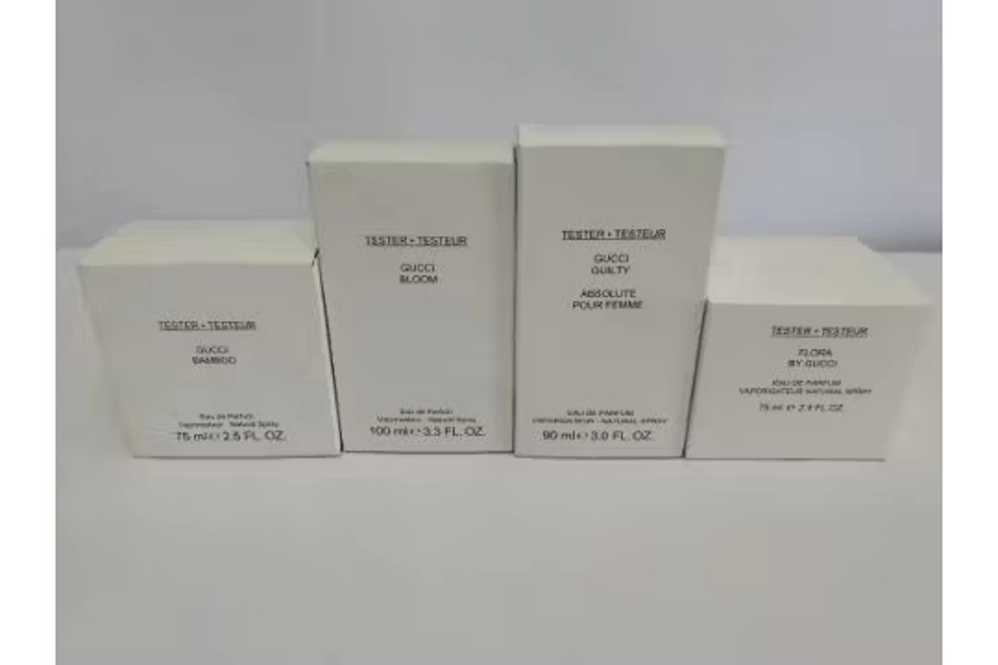 Four Gucci related perfume testers - Bloom, Guilty, Bamboo and Flora