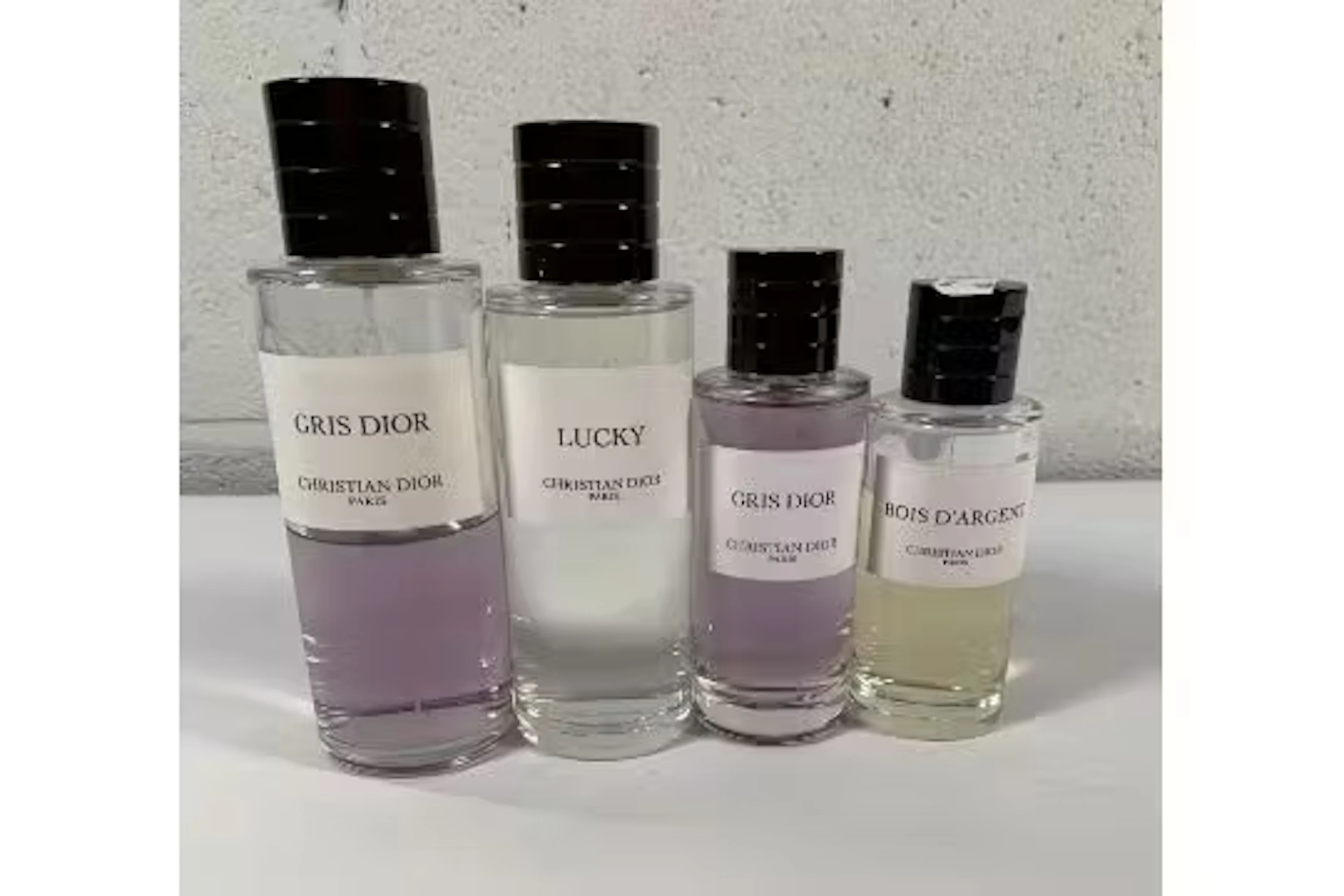 Four part used Christian Dior fragrances to include Bois D'Argent
