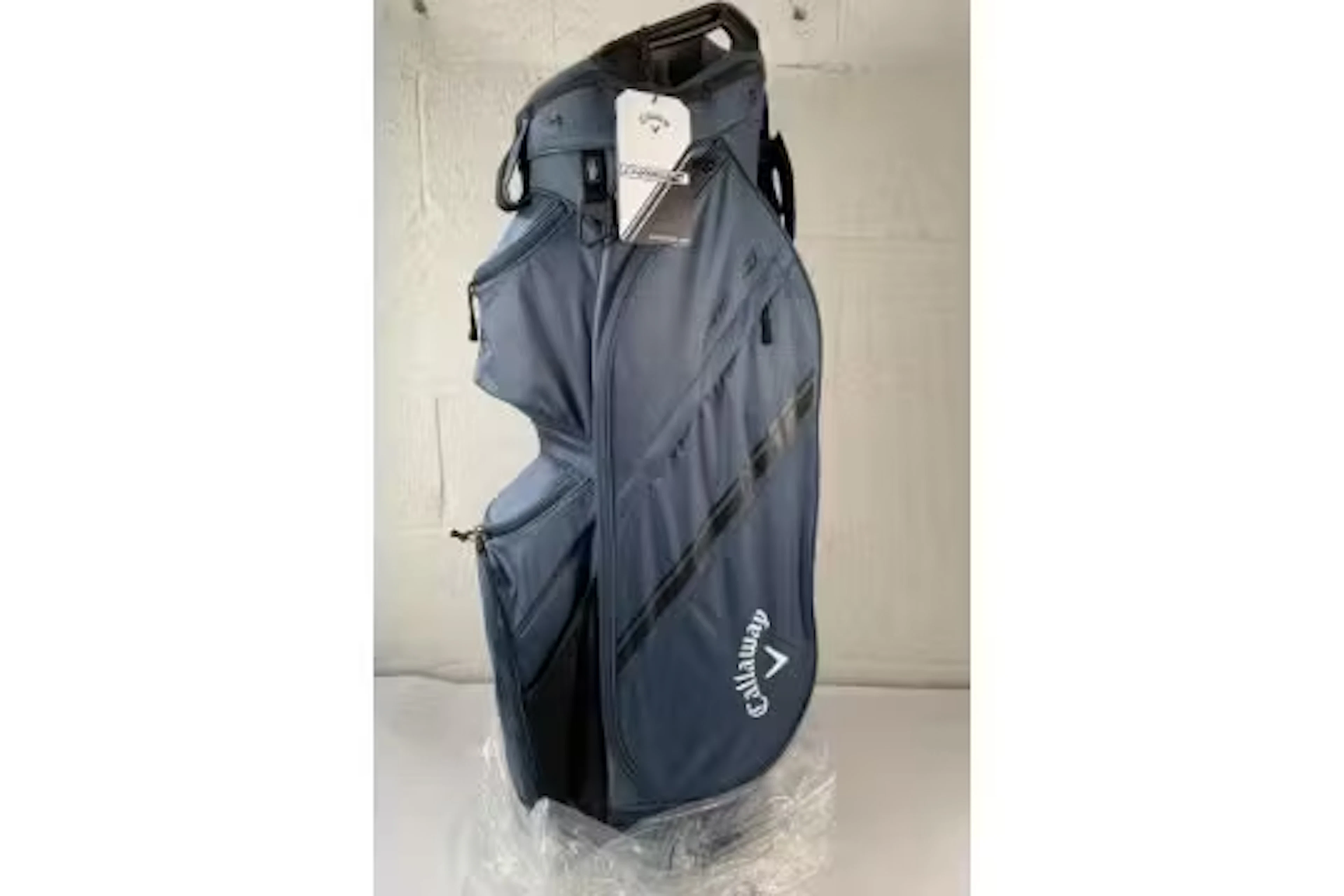 An as new Callaway Chase 14 golf cart bag, navy.