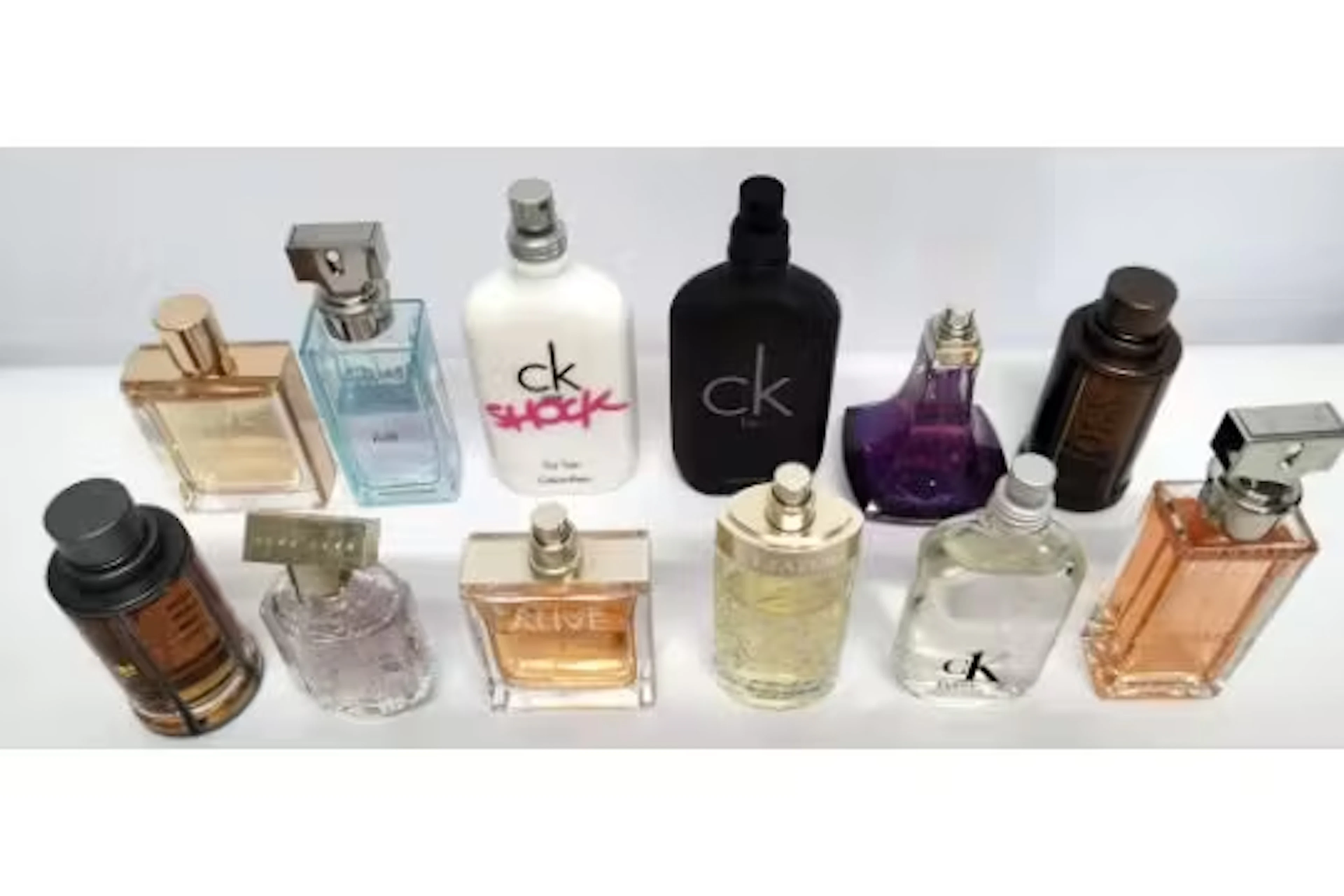 Thirty nearly new perfumes/testers and related to include Hugo Boss