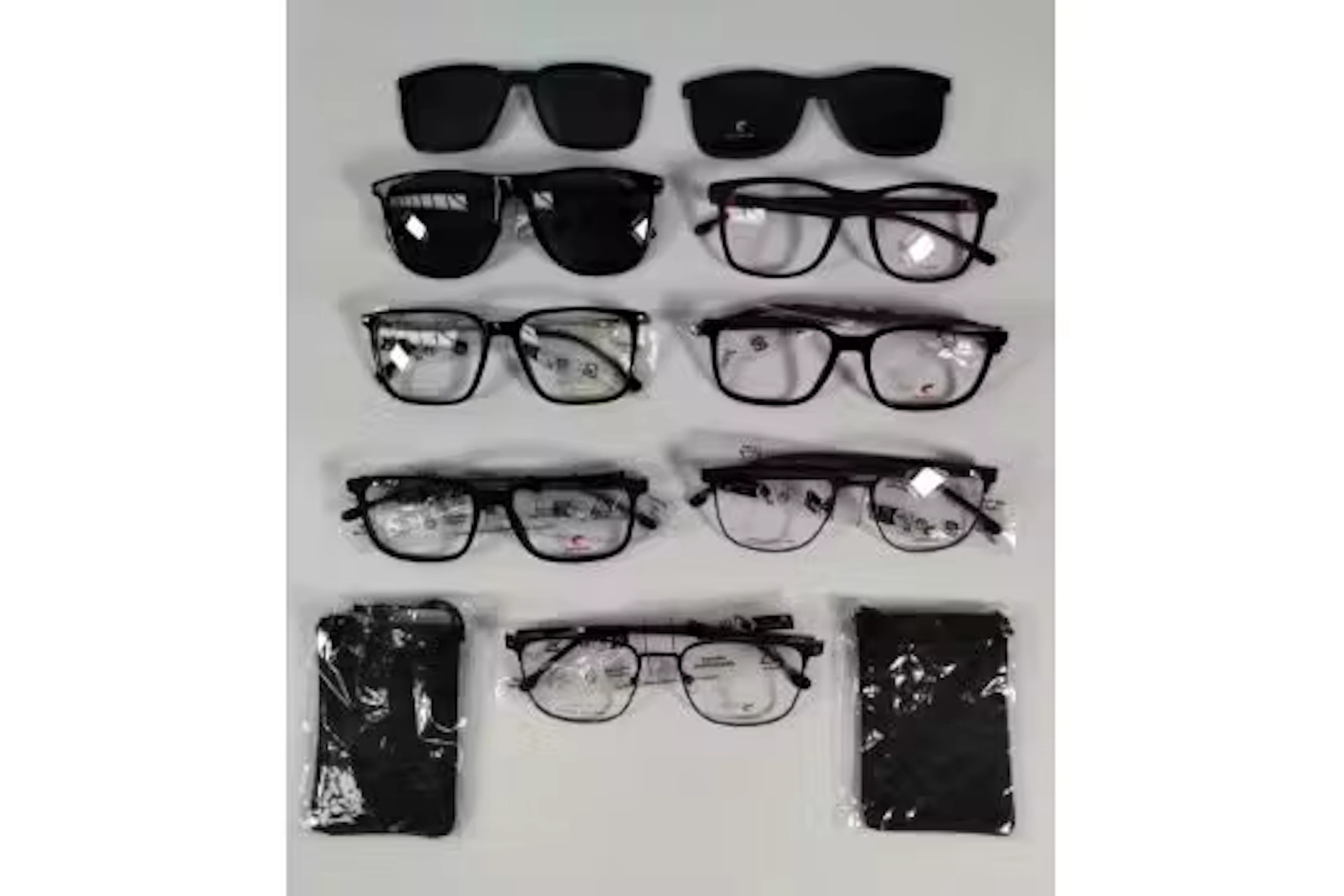 Eleven Carrera related items: seven pairs of glasses (various models