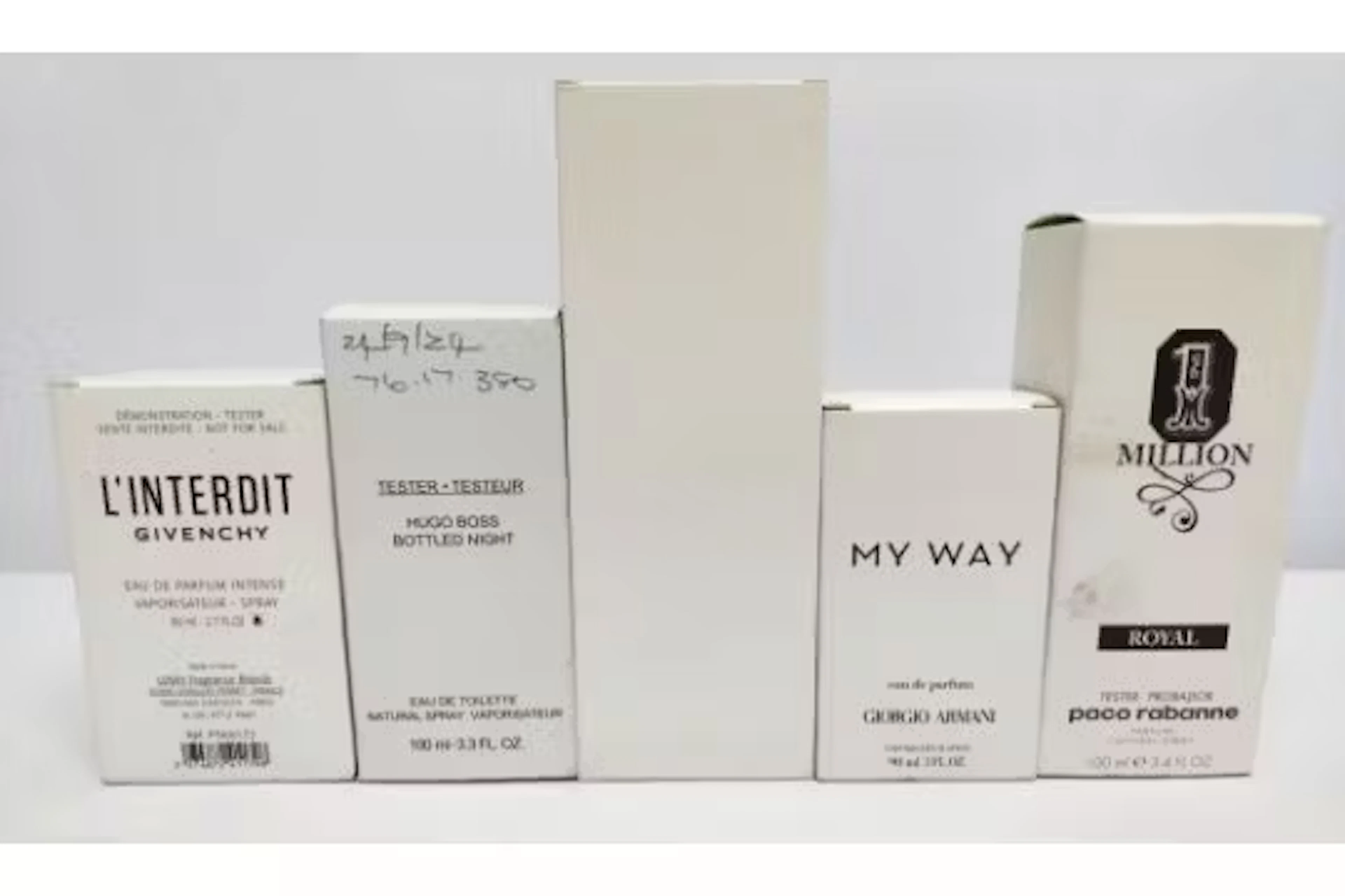 Five nearly new perfumes/testers and related- Hugo Boss, Givenchy