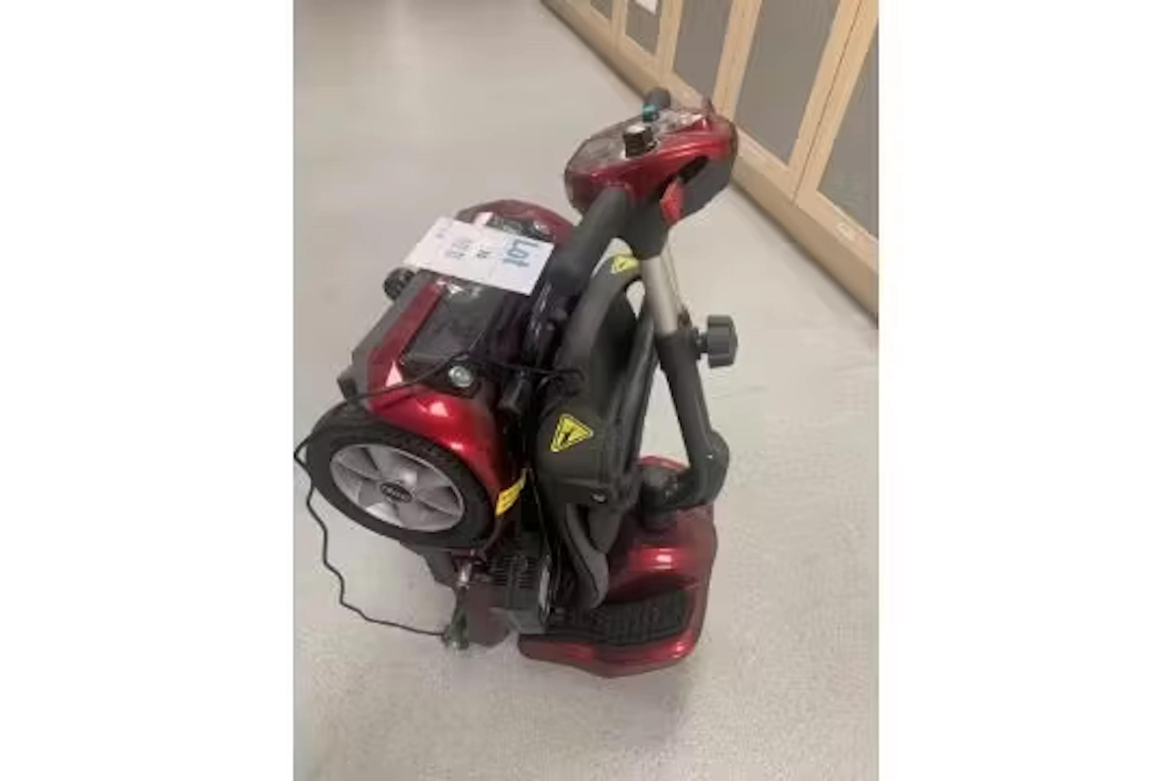 A pre-owned Drive mobility scooter with charger included (missing