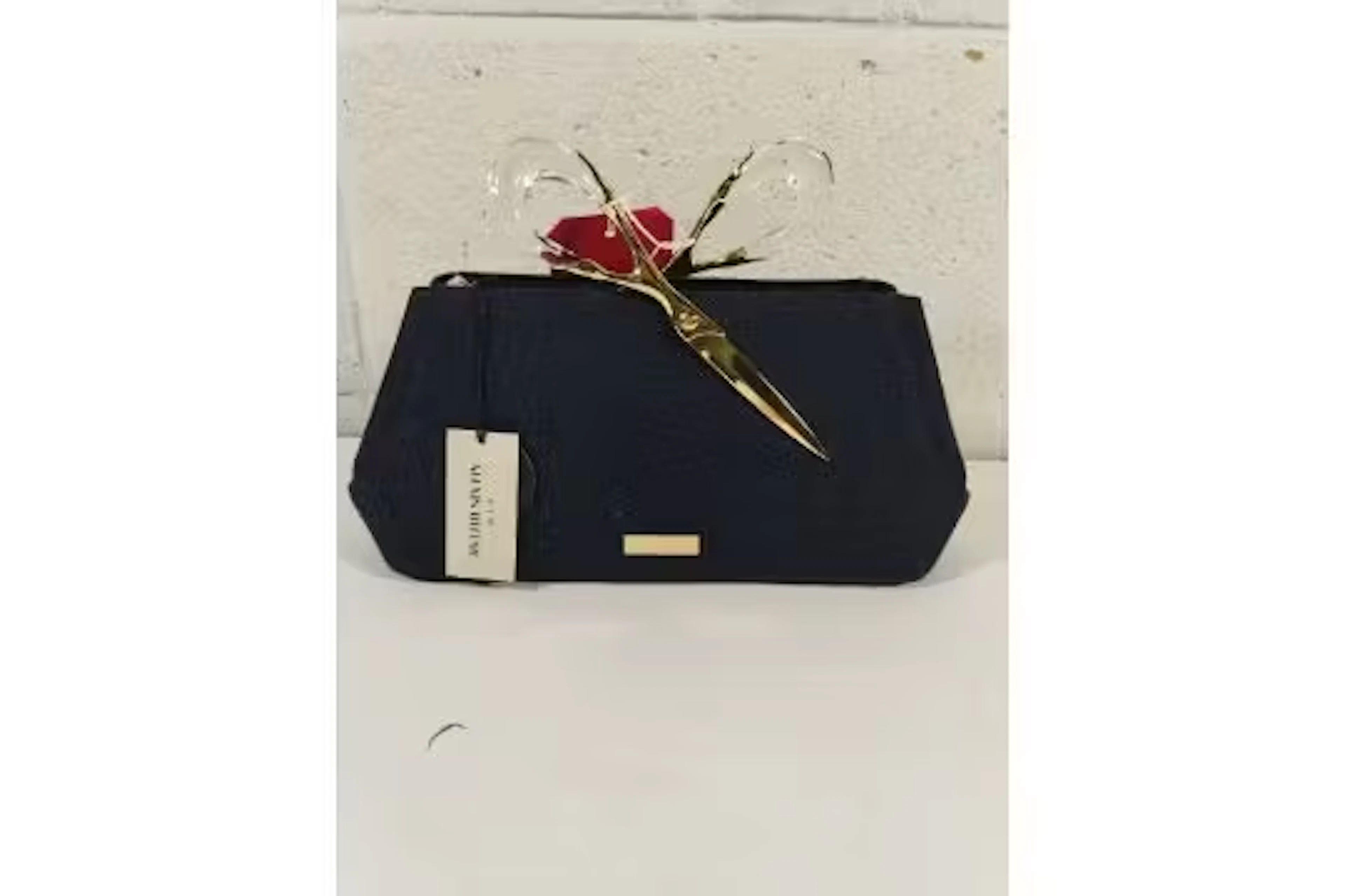 An as new with tags Alexis Bittar scissor clutch in dark denim.