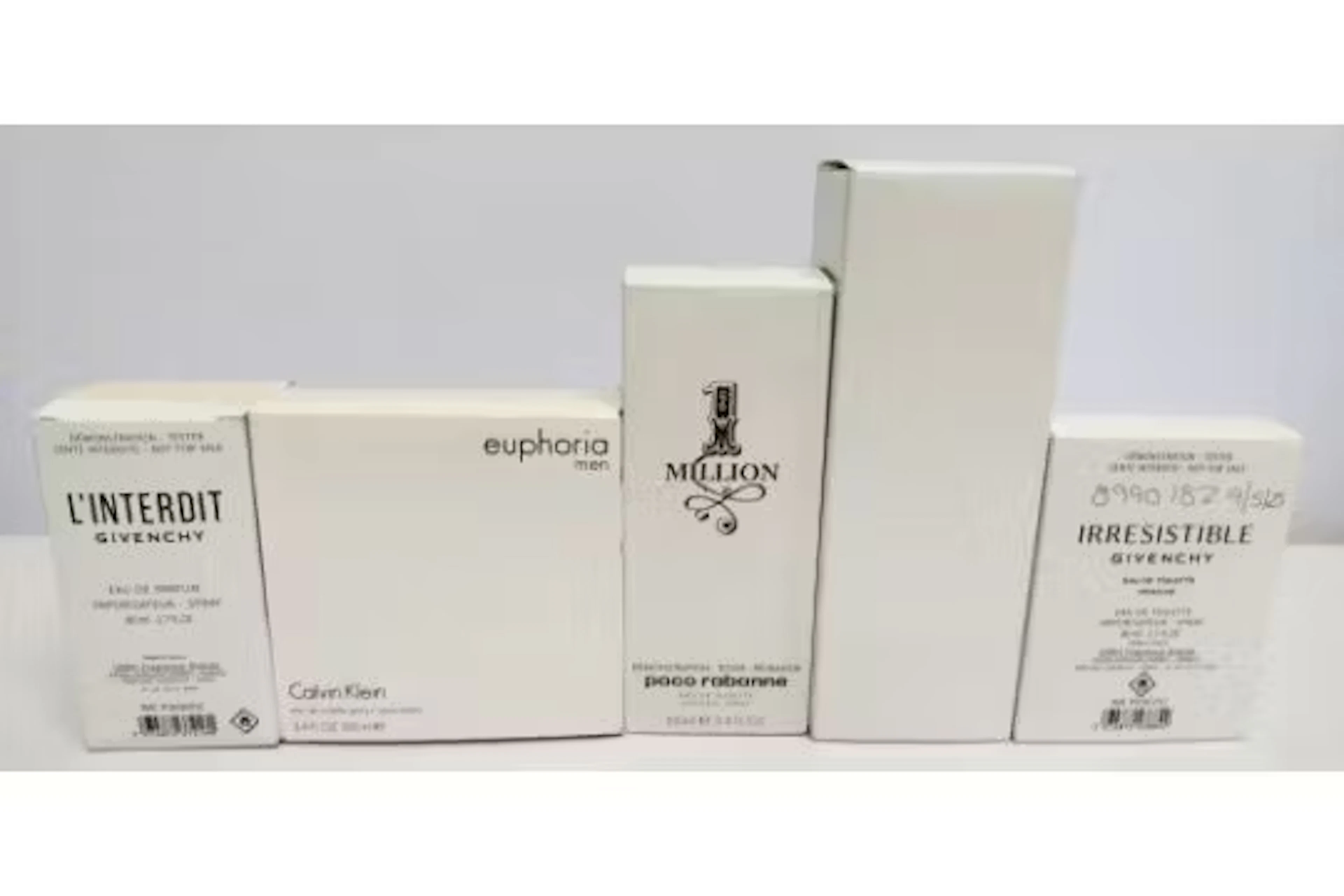 Five nearly new perfumes/testers and related- Givenchy, Paco Rabanne