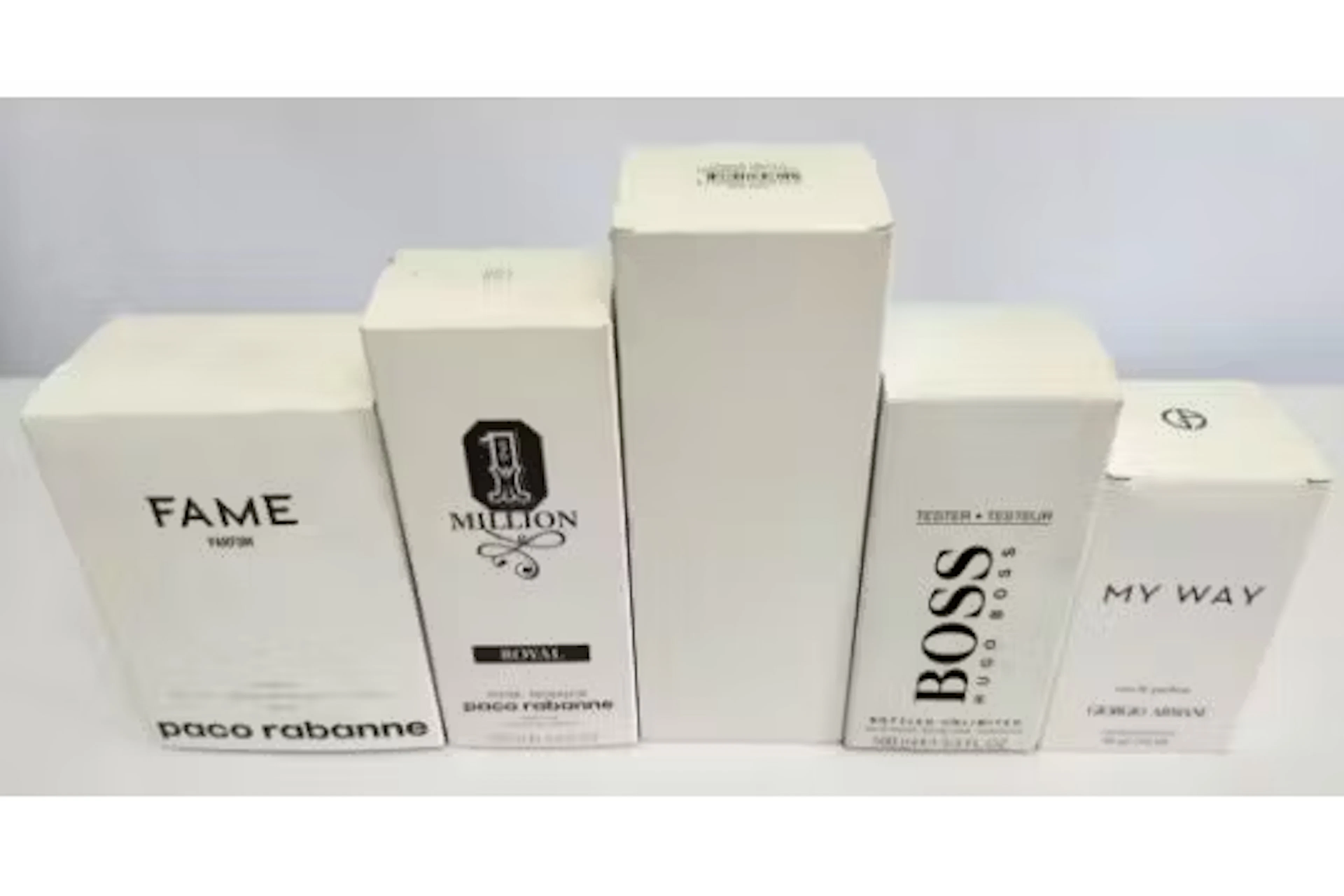 Five nearly new perfumes/testers and related- Paco Rabanne, Hugo Boss