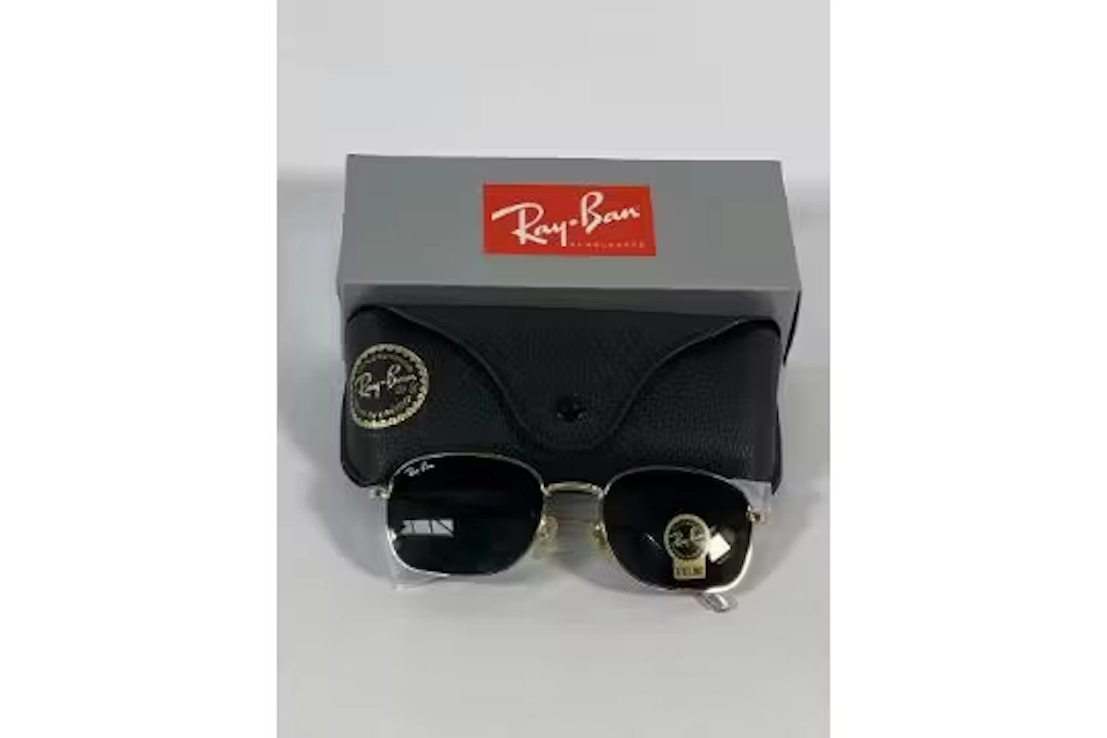 A pair of Ray-Bans Pillow sunglasses in polished gold with G-15 green