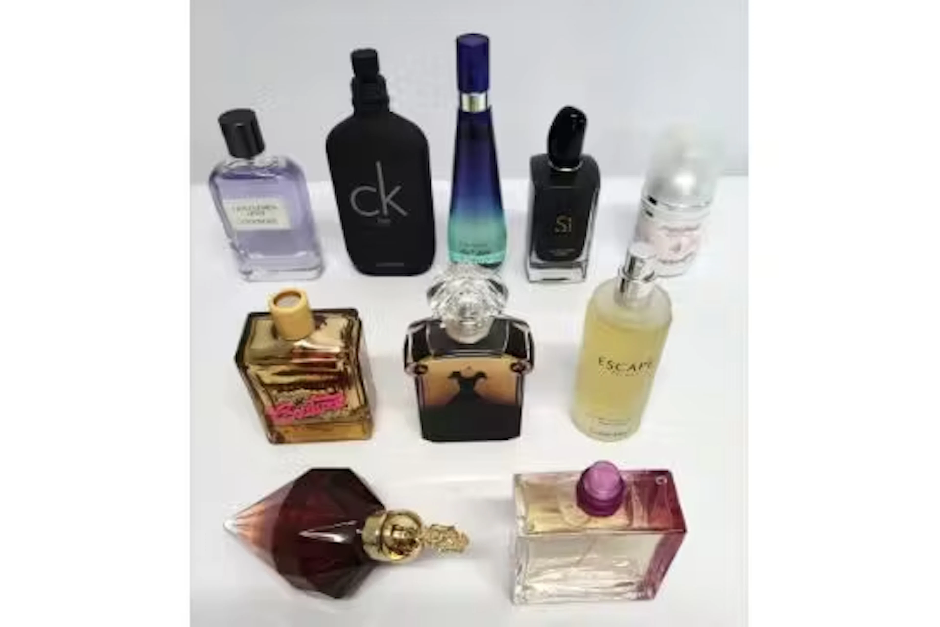 Thirty nearly new perfumes/testers and related to include Versace