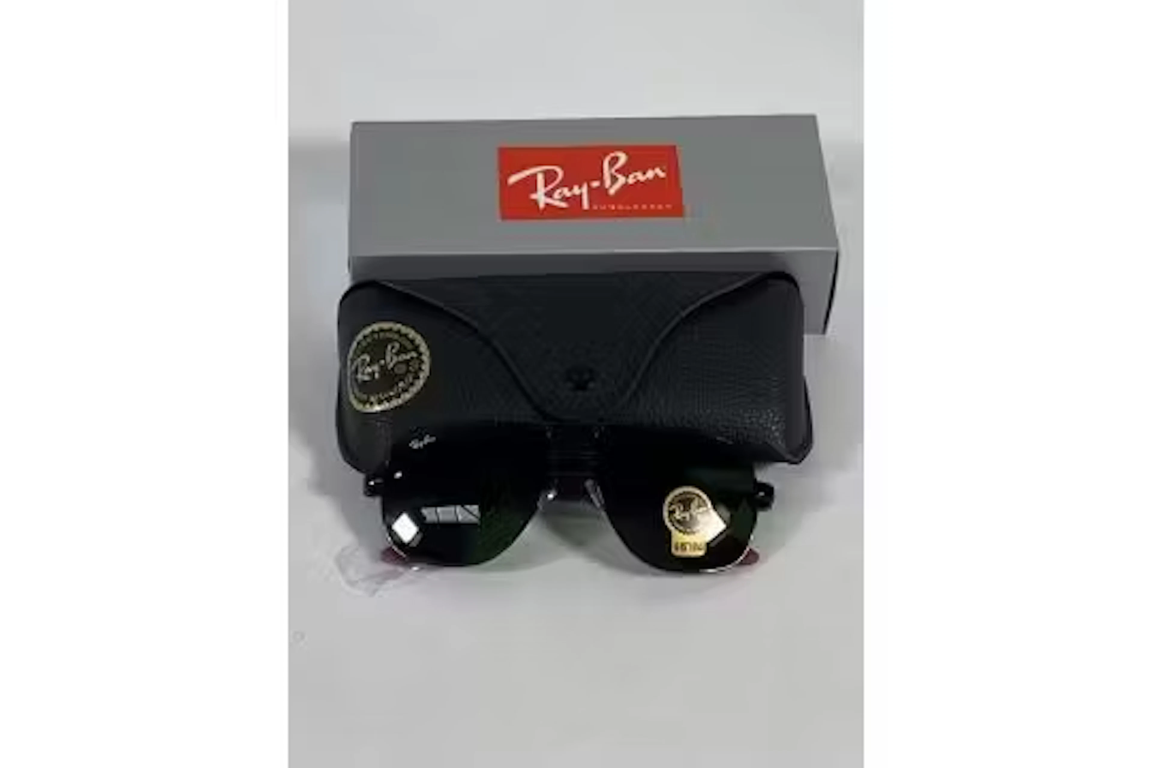 A pair of Ray-Bans Square sunglasses in black and red with G-15 green
