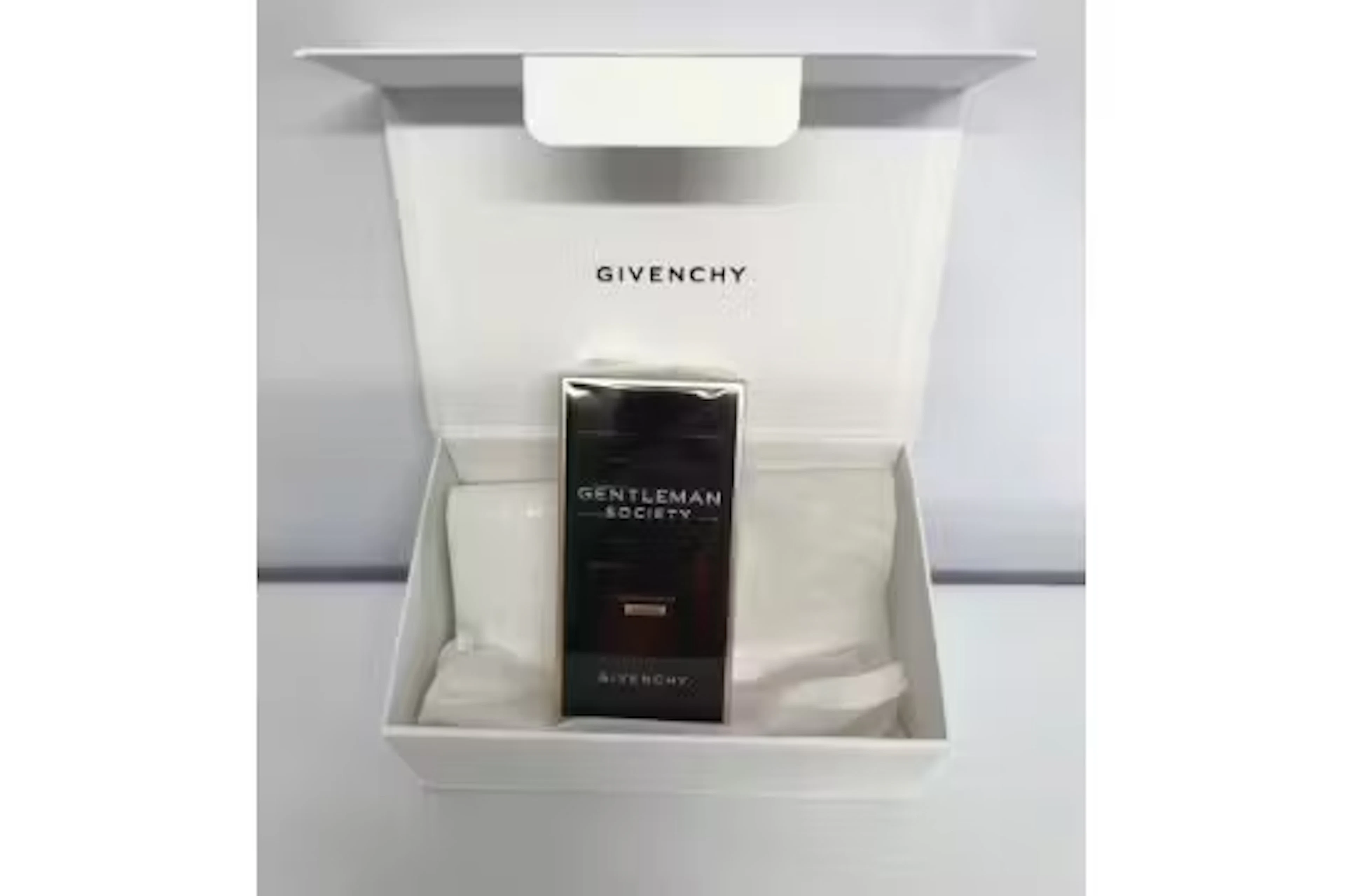 An as new Givenchy Gentleman Society eau de parfum ambree 100ml, sealed box.