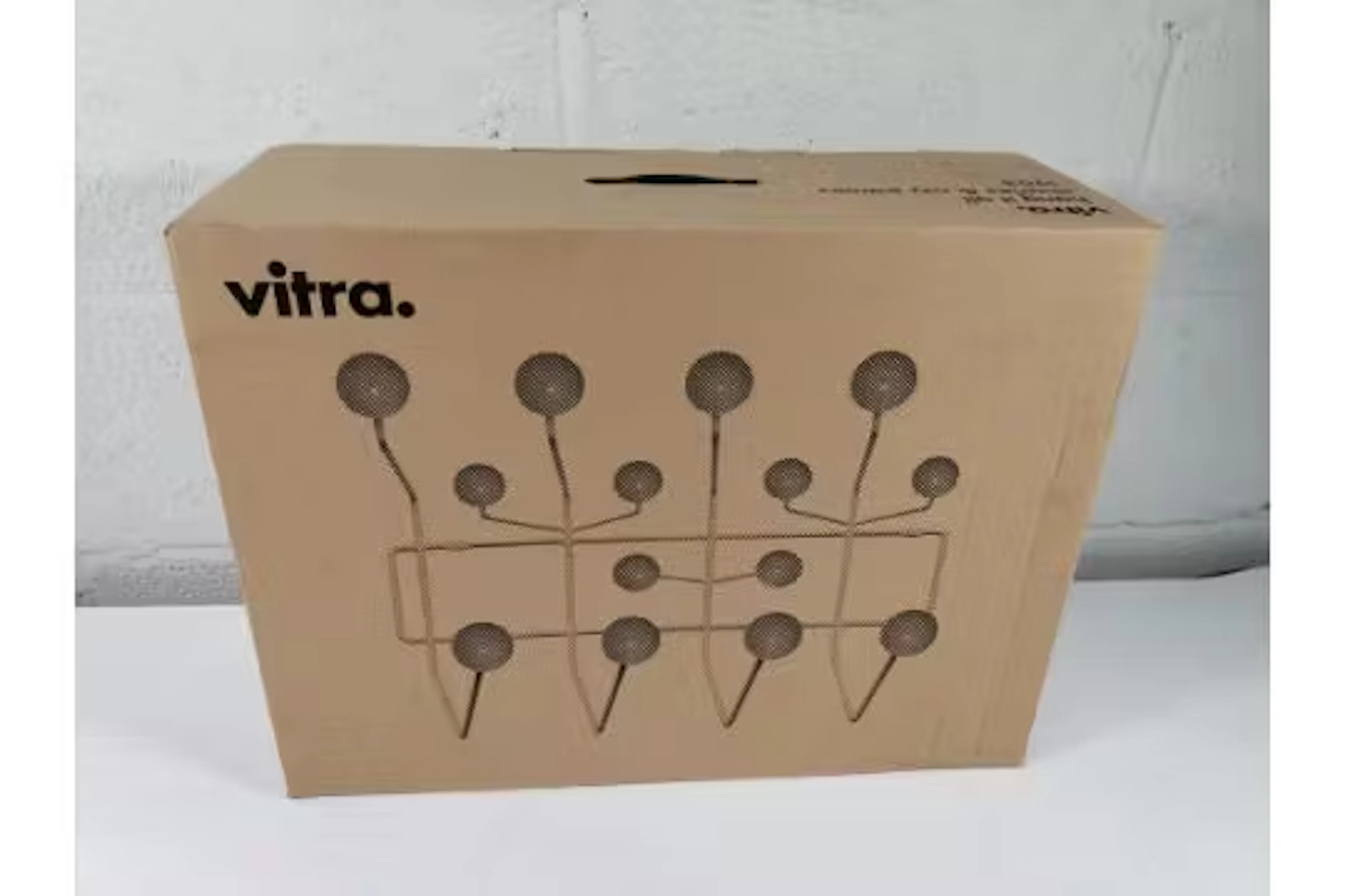 An as new Vitra 'Hang It All' in white pine, designed by Charles and