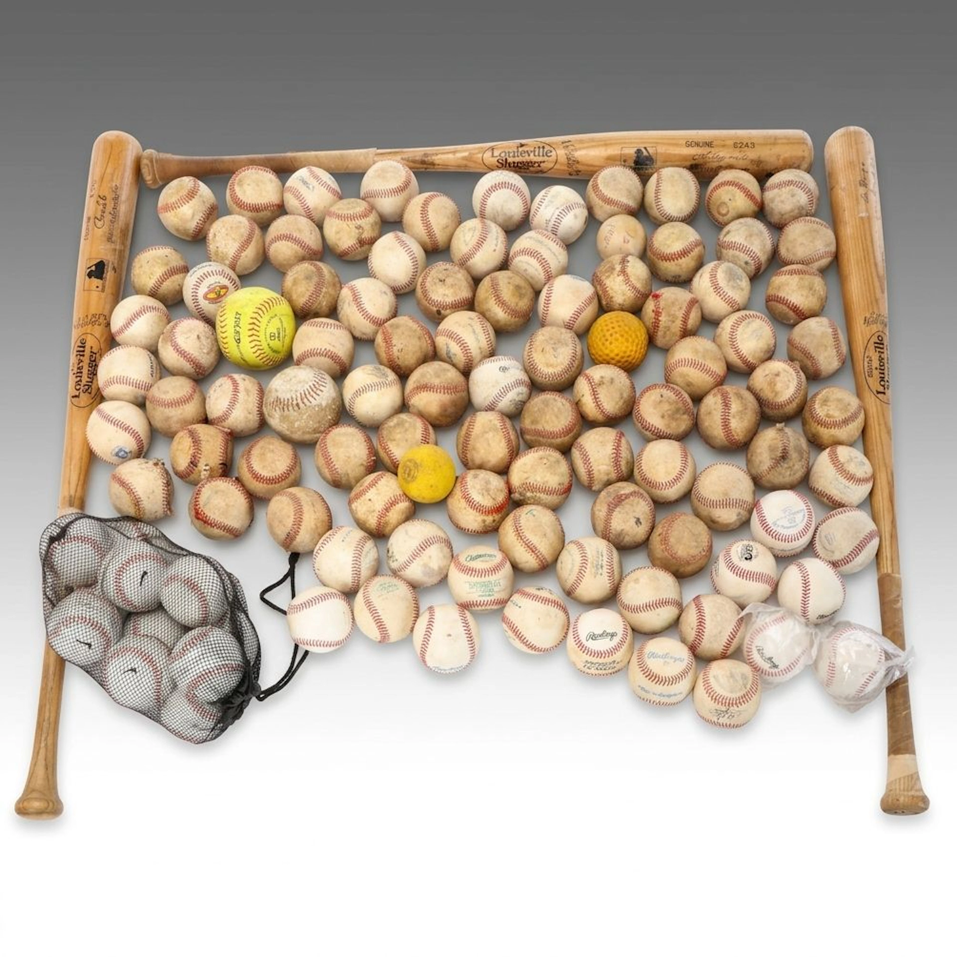 Baseball Bats and Assorted Field Hockey, Softball and Baseballs