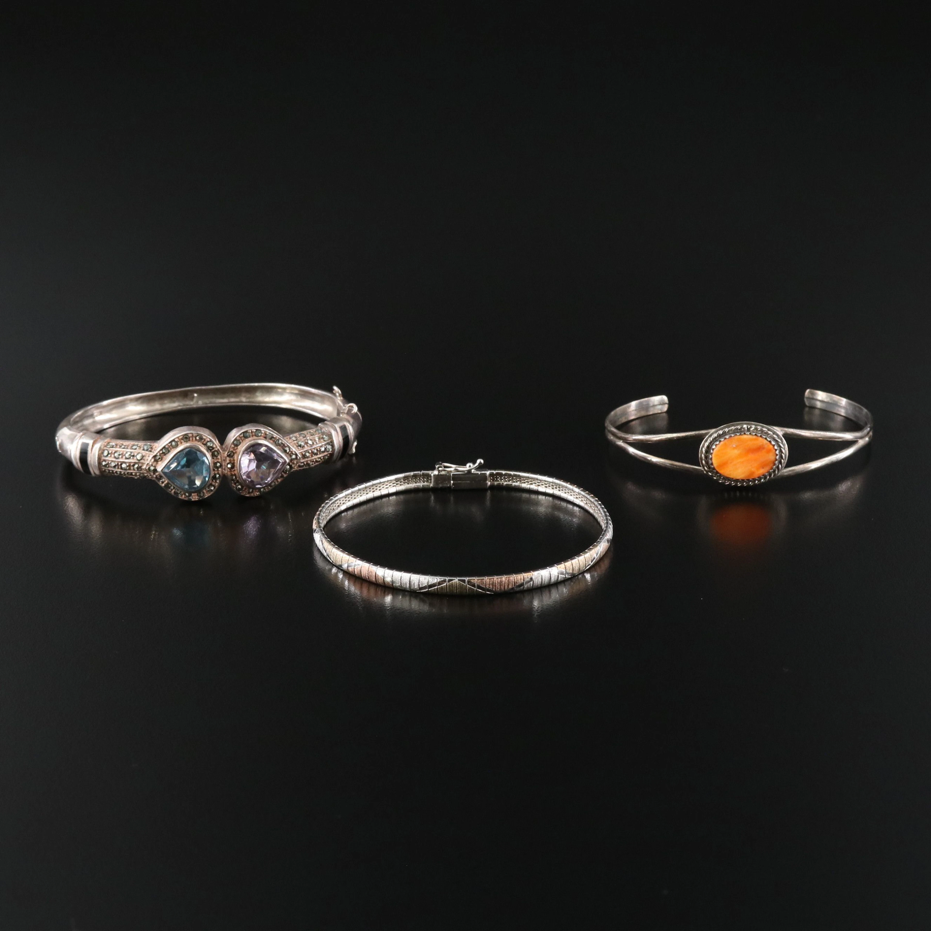 Spiny Oyster, Amethyst, and Blue Topaz Featured in Sterling Bracelets