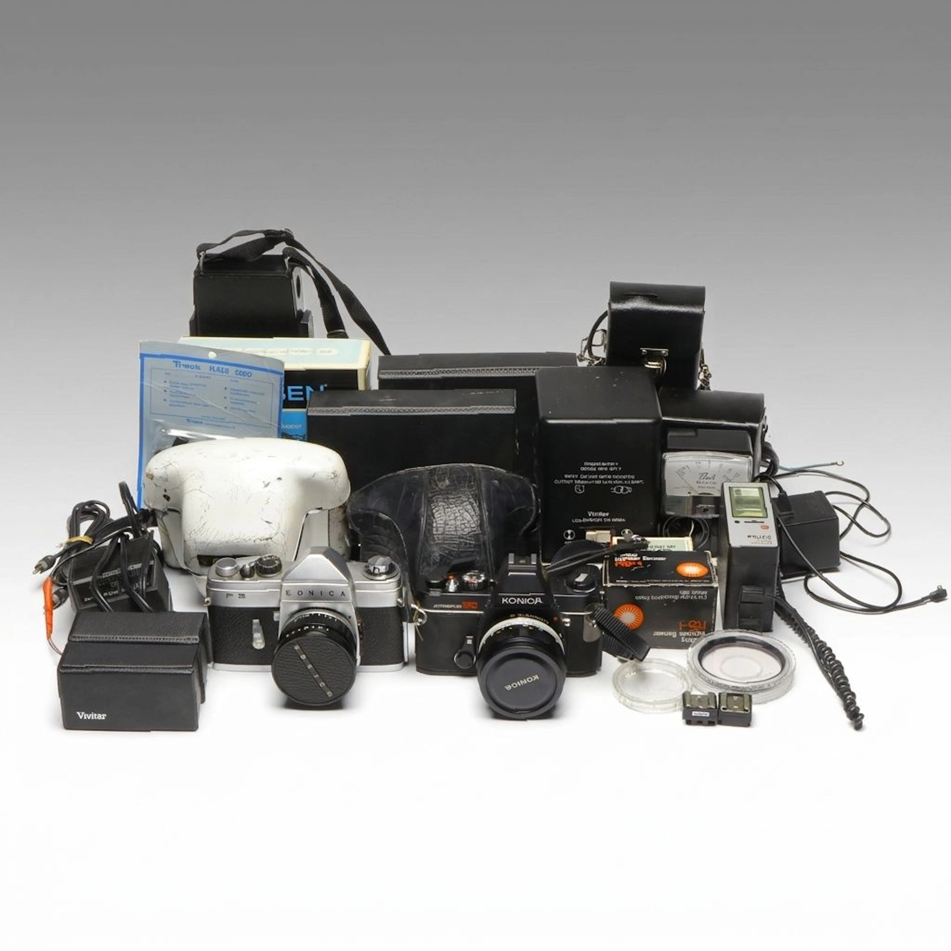 Konica "Autoreflex TC" and "FS" with Vintage Camera Accessories