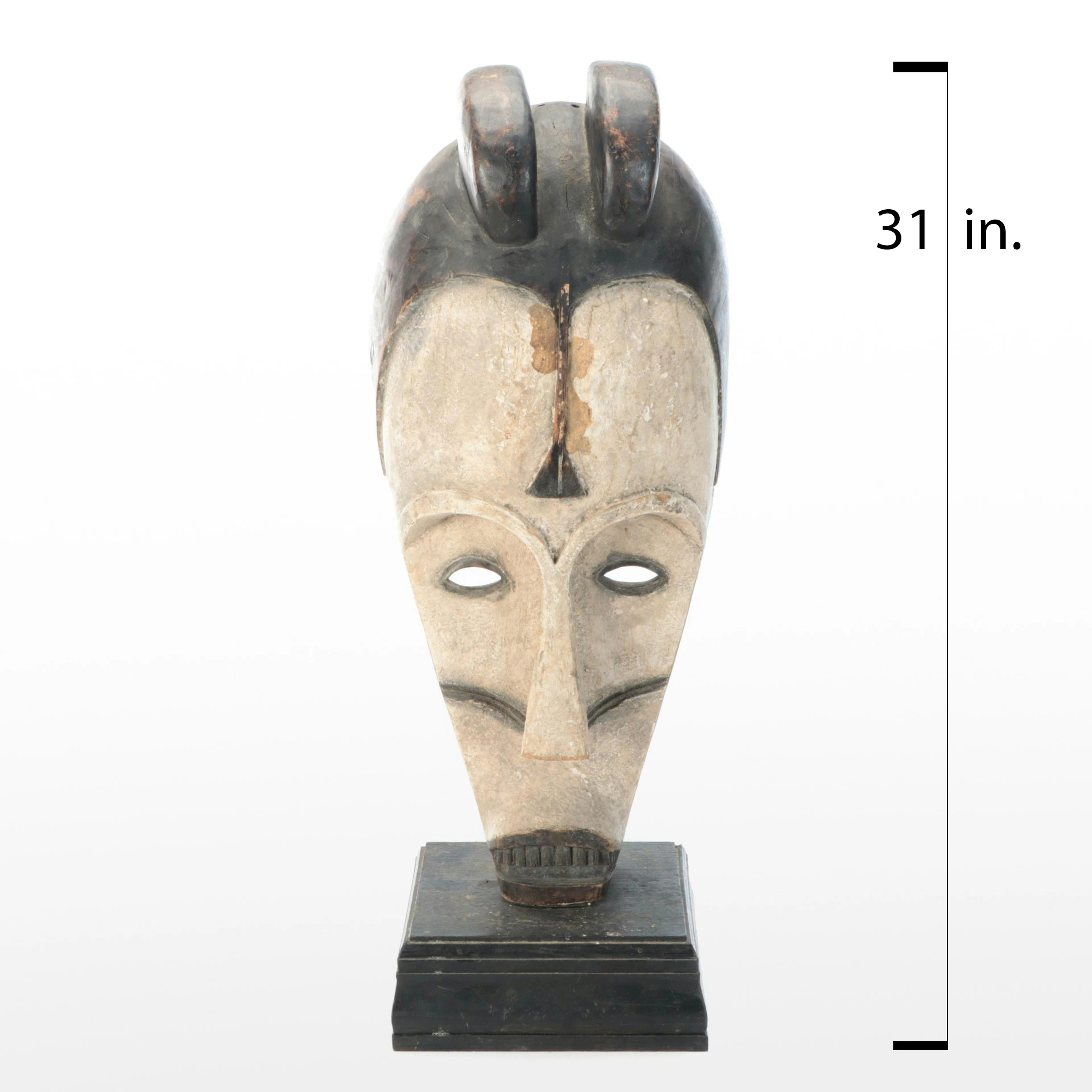 Fang Peoples "Ngil" Wood Mask on Base, 20th Century