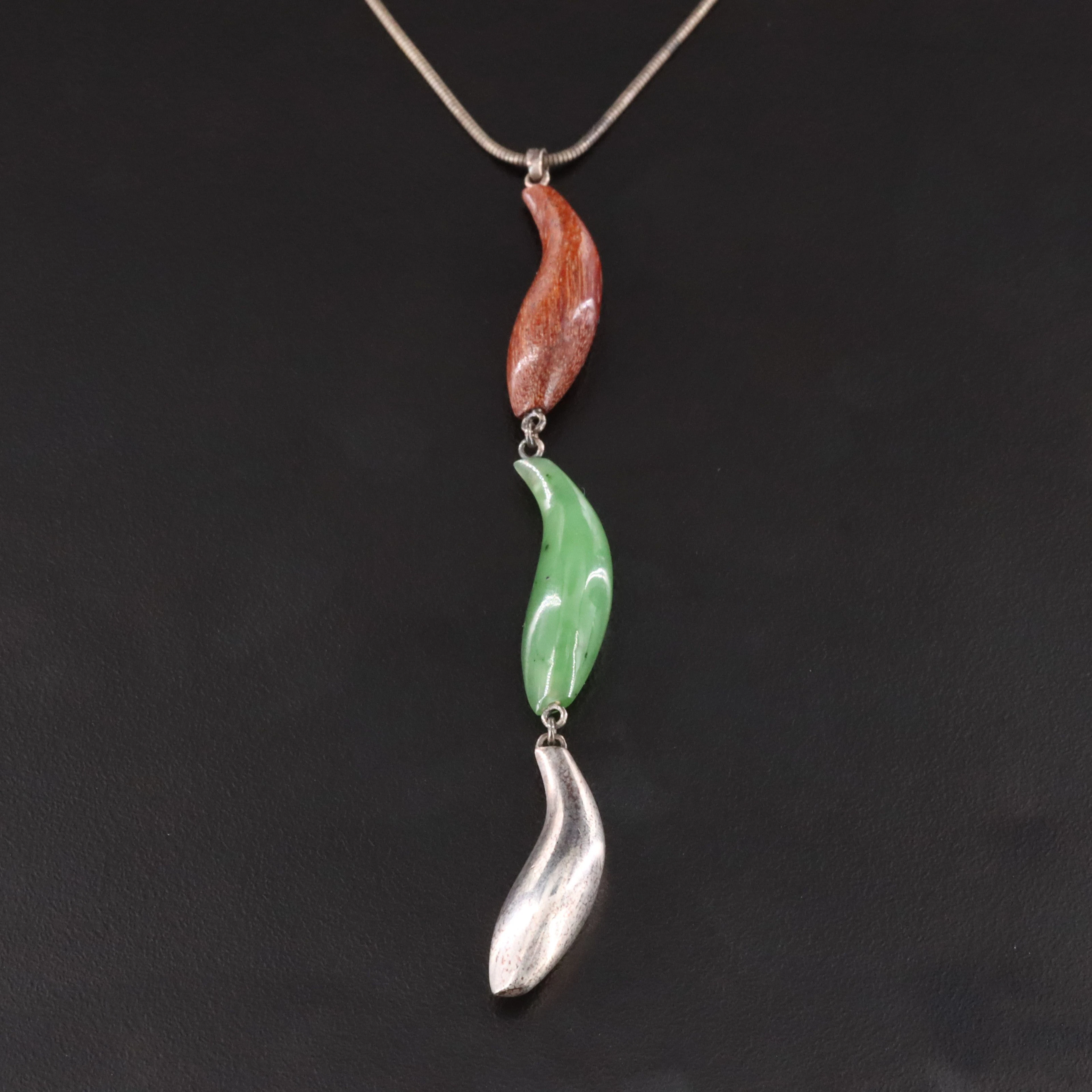 Frank Gehry for Tiffany & Co. Sterling, Nephrite and Wood Three Fish Necklace