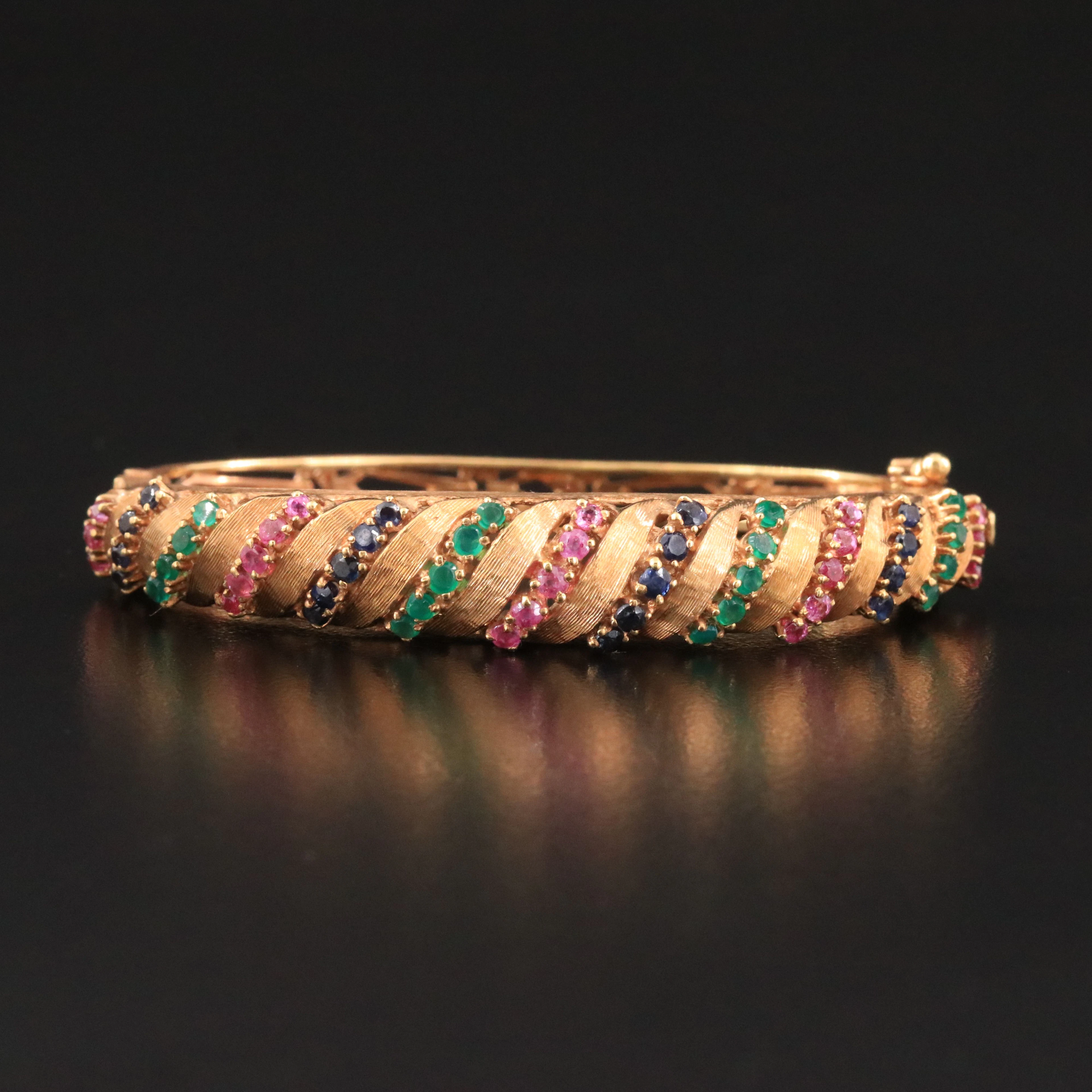 Jack Gutschneider 1960s 18K Ruby, Sapphire, and Emerald Hinged Bracelet