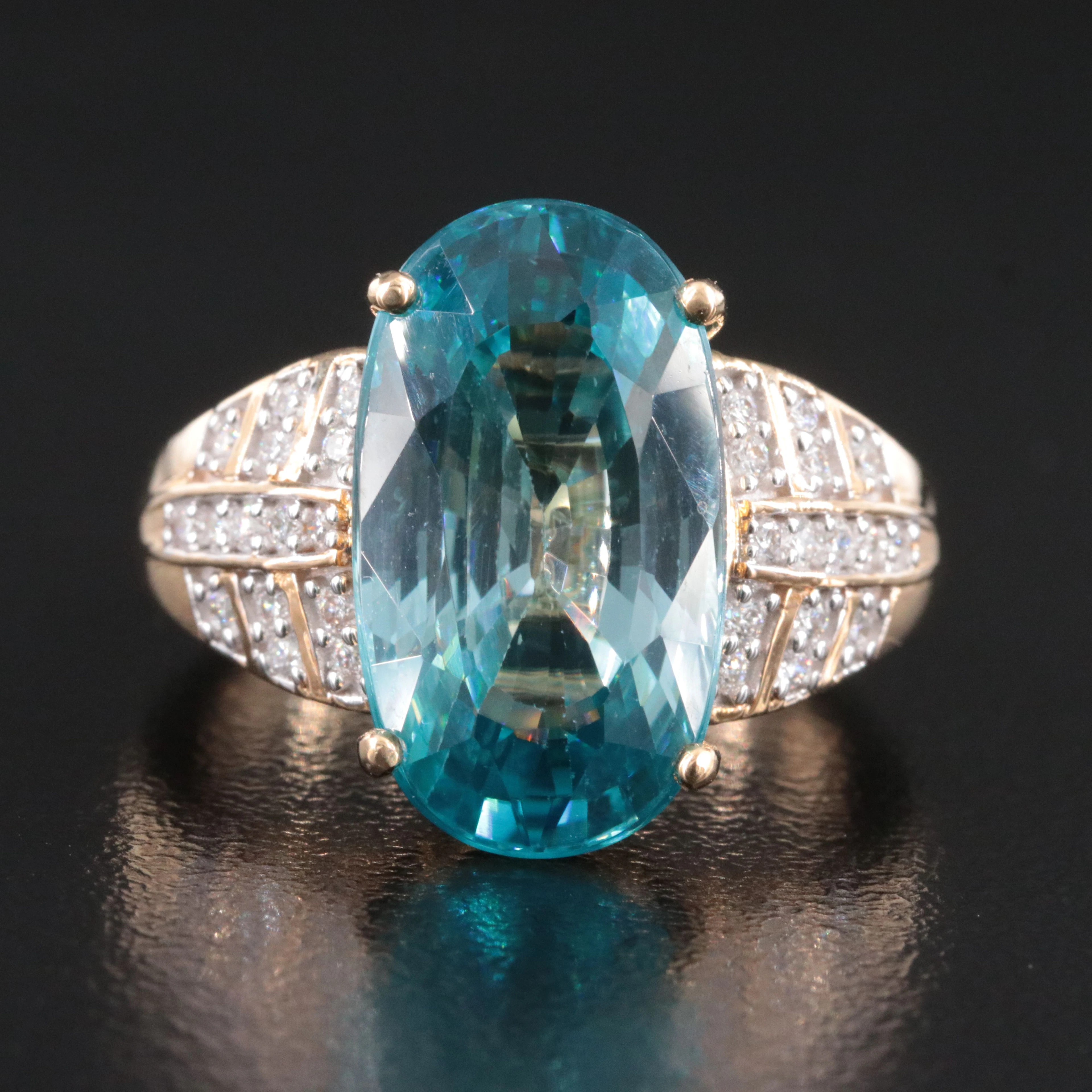 14K Blue Zircon and 0.26 CTW Diamond Ring