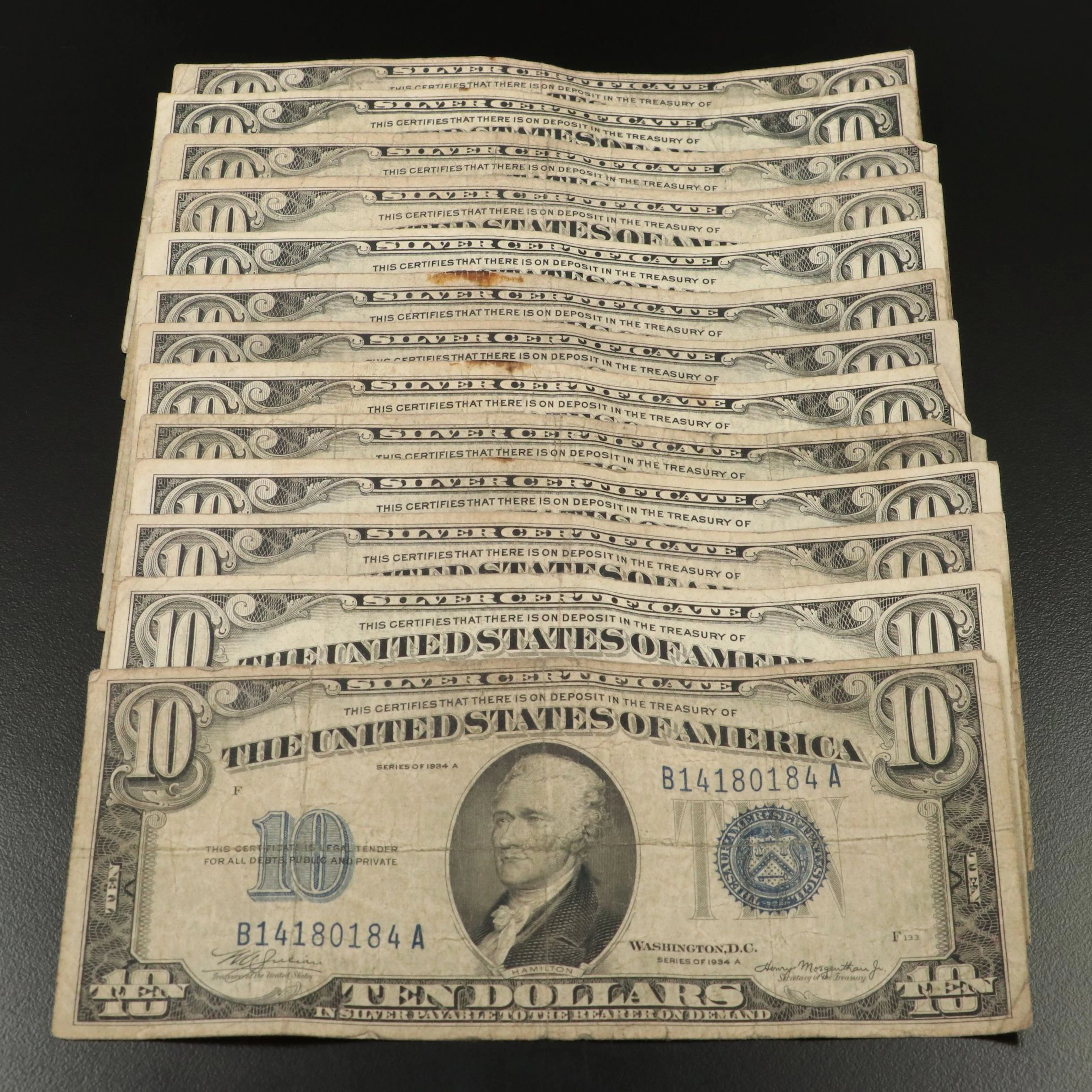 Thirteen 1934 $10 Blue Seal Silver Certificates