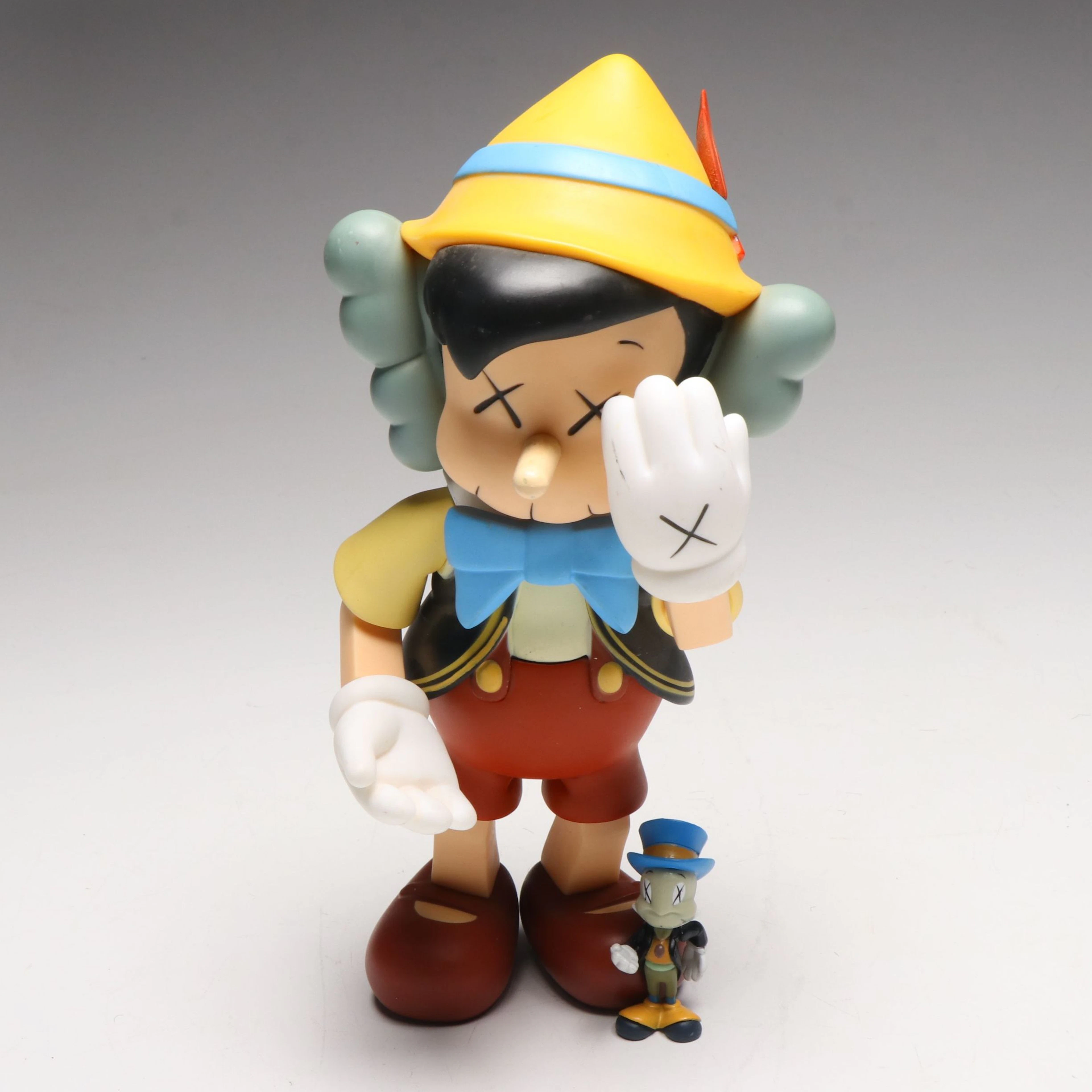 Disney x KAWS Vinyl Pinocchio and Jiminy Cricket Art Figurines