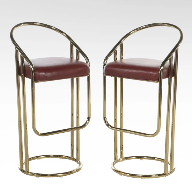 Pair of Postmodern Style Brass Tone Tubular Metal and Burgundy Vinyl Barstools
