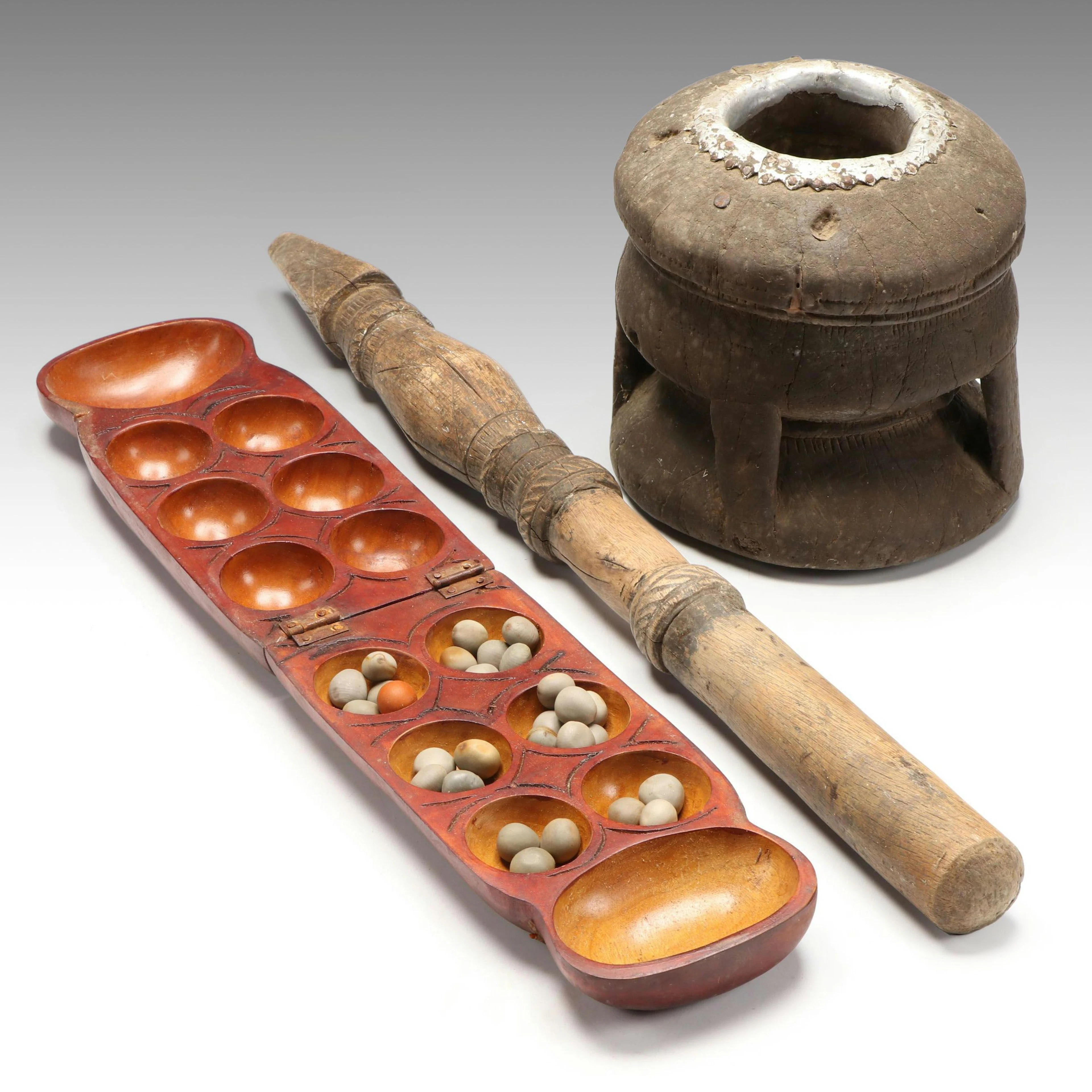 Wood Mancala Board with Seed Game Pieces with Carved Wood Post and Vessel