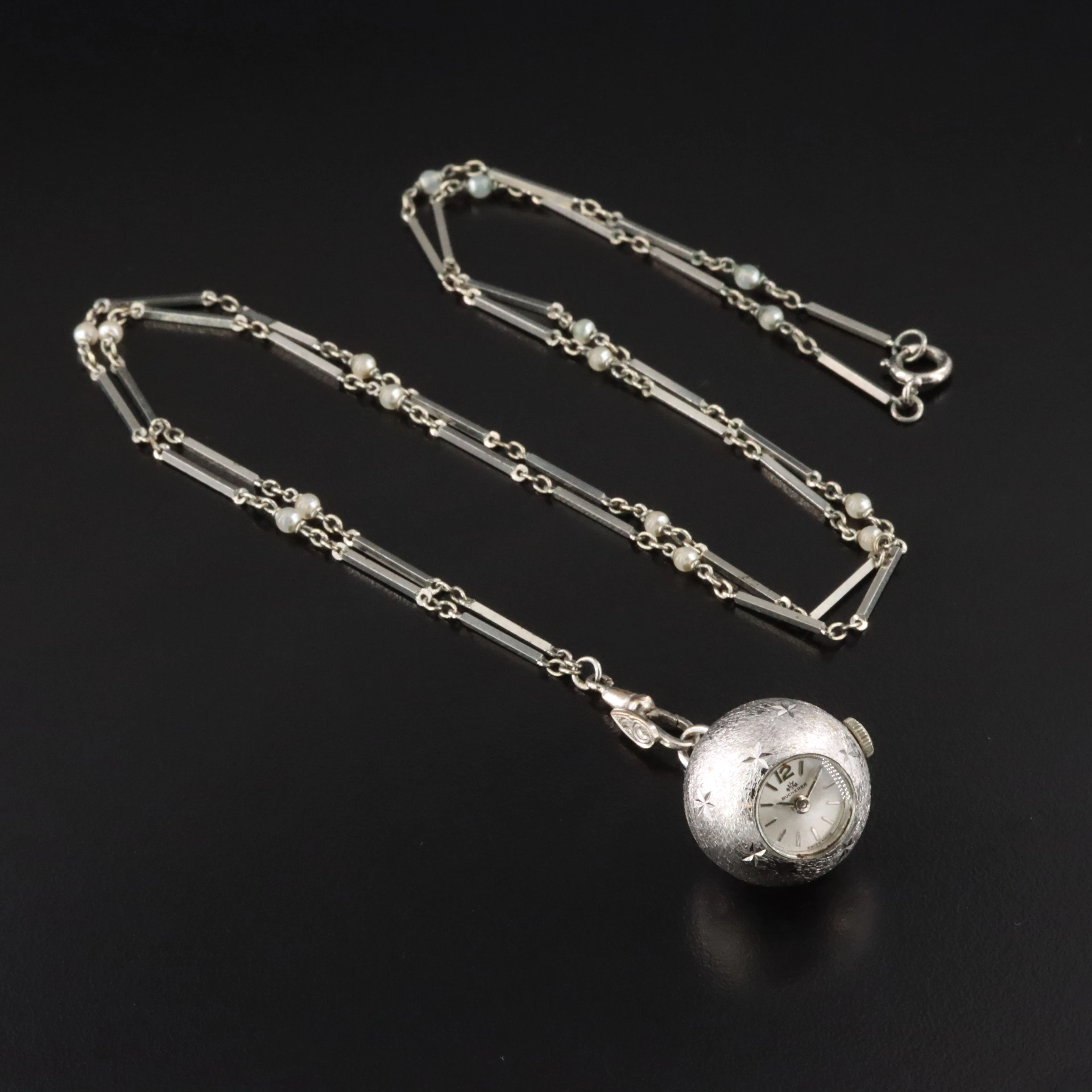 Bucherer Silver Tone Star Accented Swiss Orb Pendant Watch
